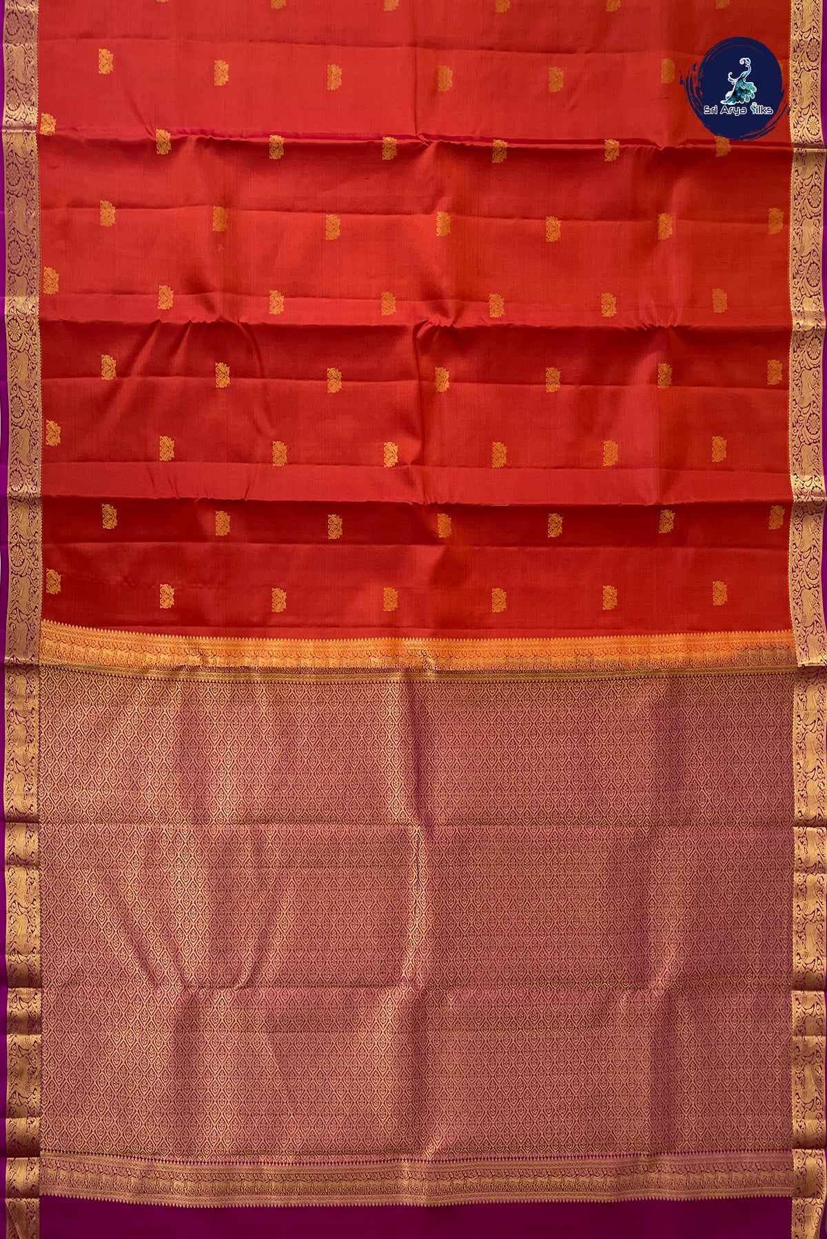 Reddish Orange Light Weight Silk Saree With Zari Buttas Pattern