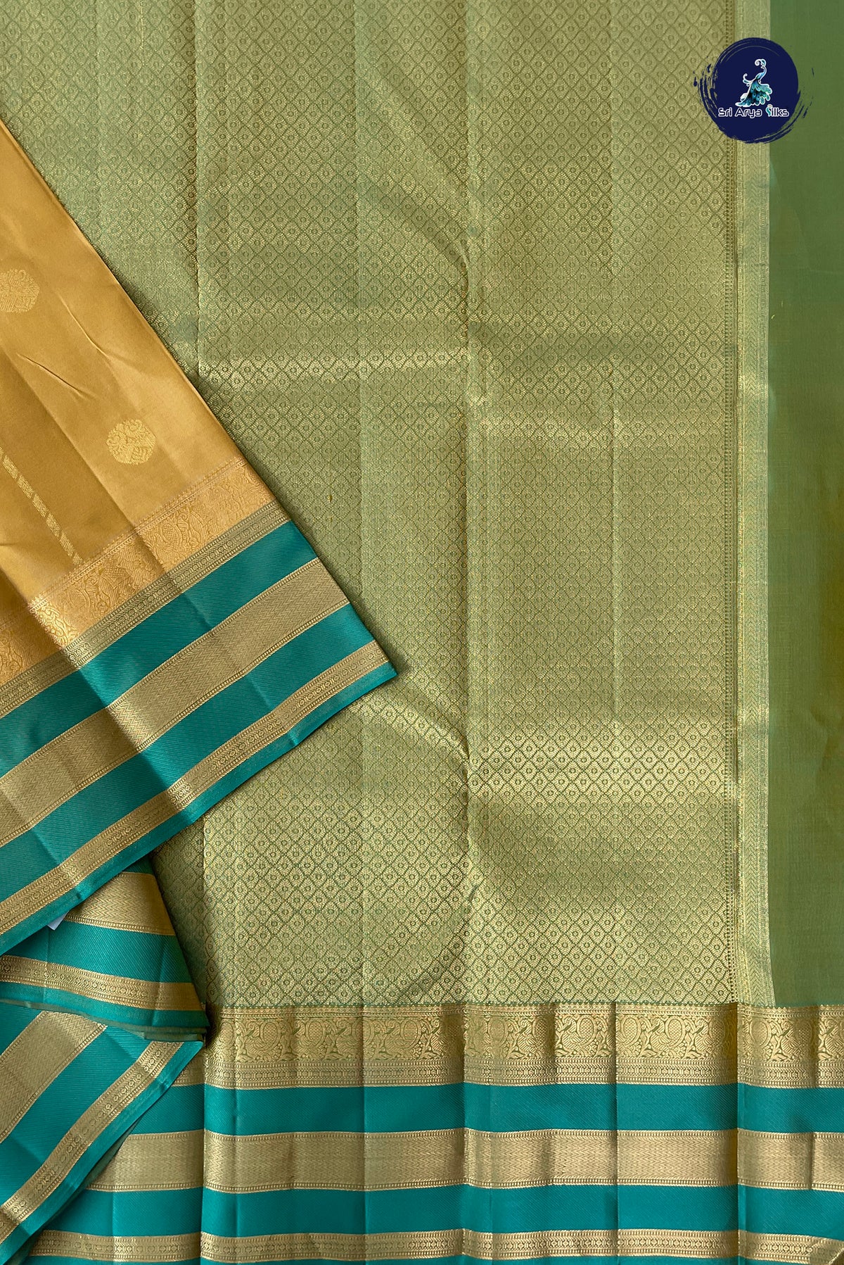 Beige Bridal Silk Saree With Zari Buttas Pattern
