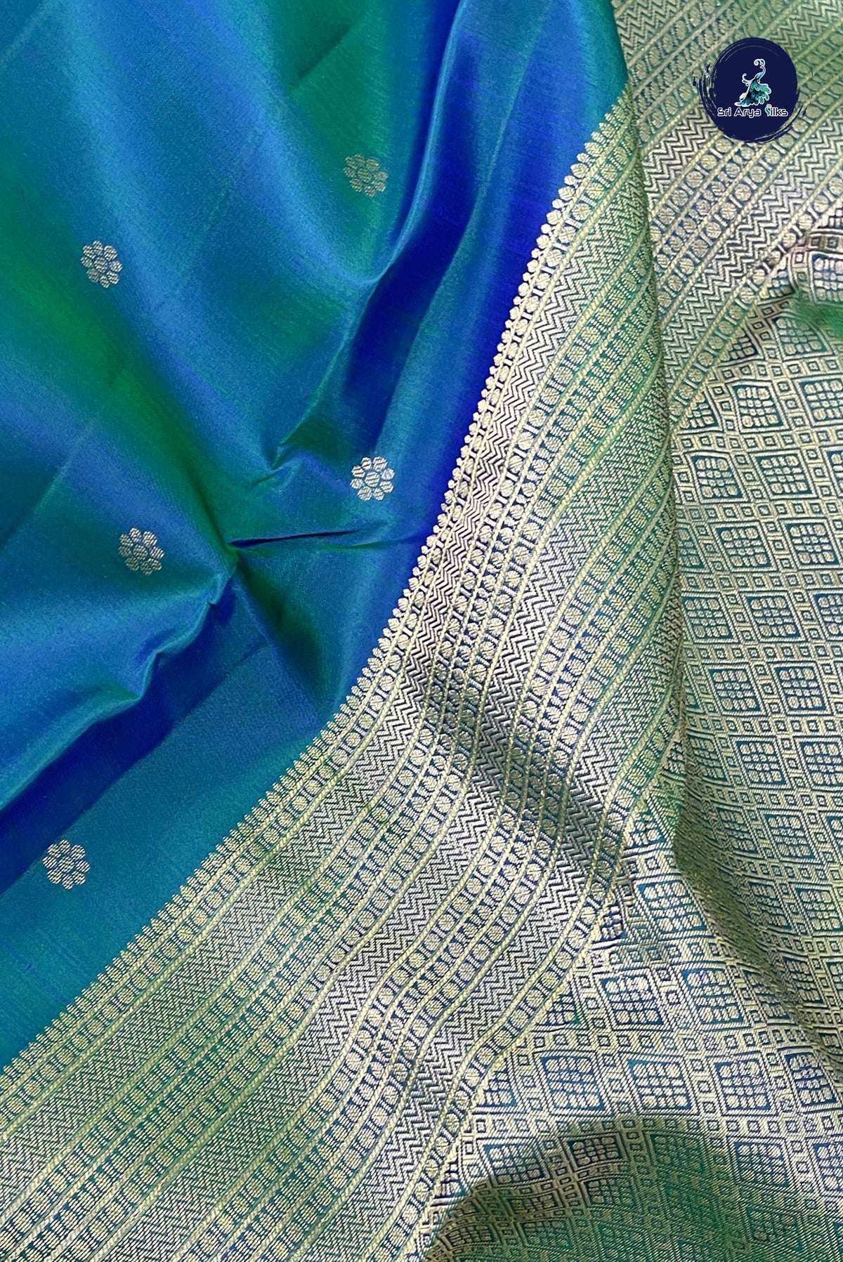 Peacock Blue Bridal Silk Saree With Zari Buttas Pattern