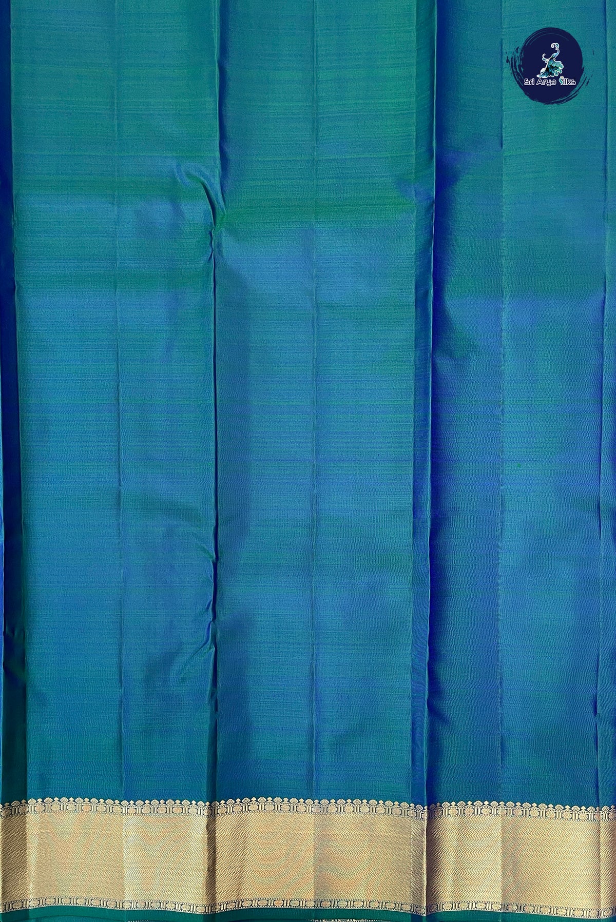 Peacock Blue Bridal Silk Saree With Zari Buttas Pattern