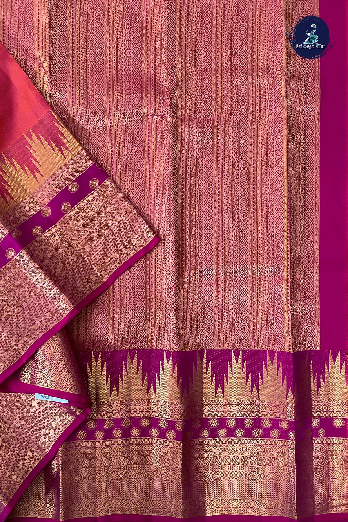 Orangish Pink Thalampoo / Temple Border Silk Saree With Plain Pattern