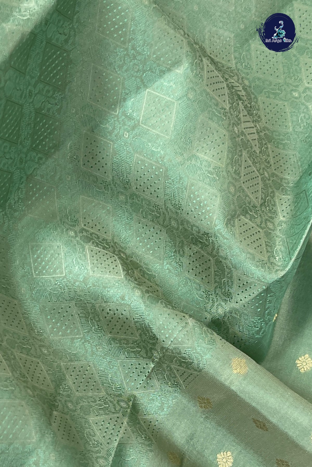 Pastel Green Thread Work Silk Saree With Embossed Pattern