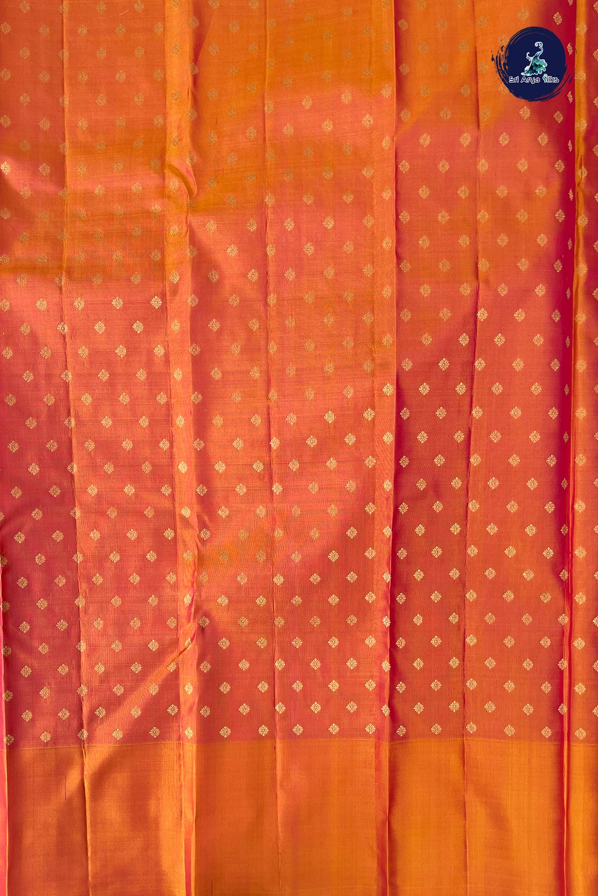 Pinkish Orange Thread Work Silk Saree With Embossed Pattern