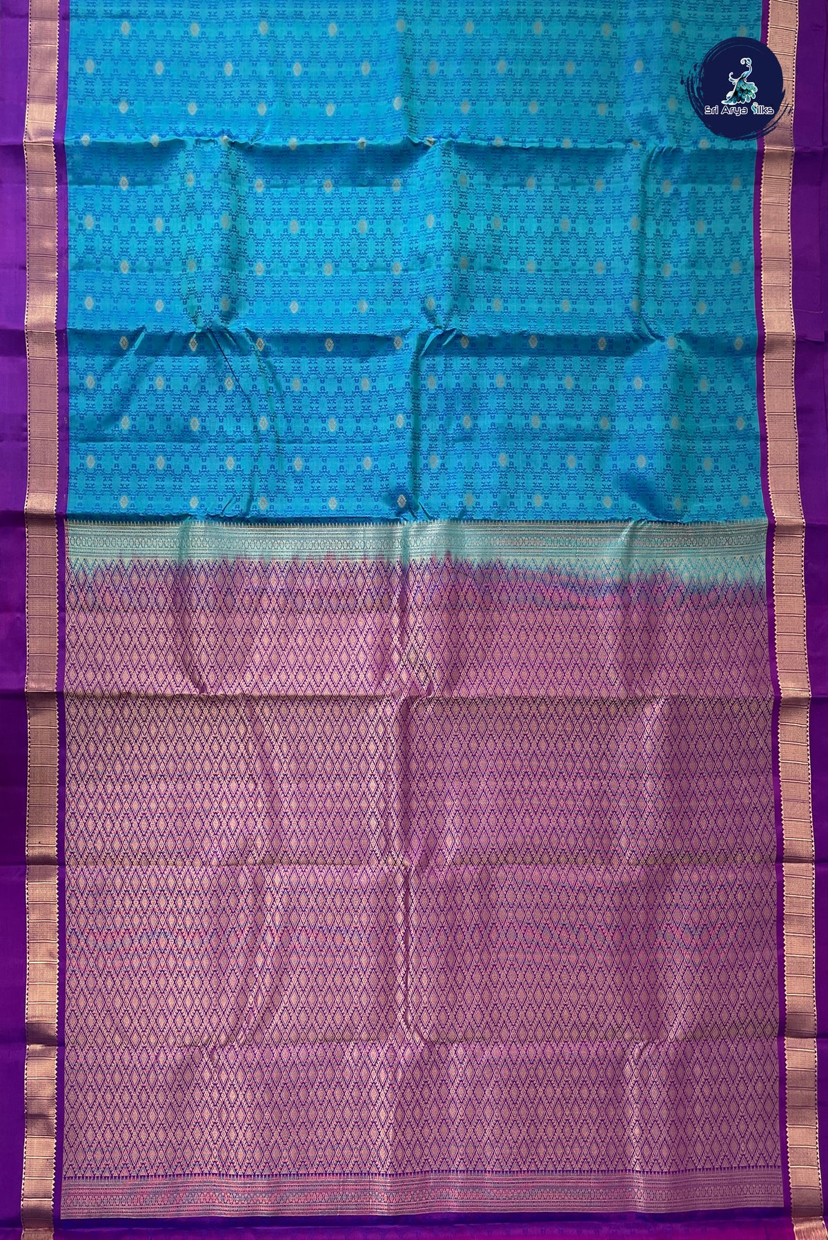 Dual Tone Blue Bridal Silk Saree With Embossed Pattern