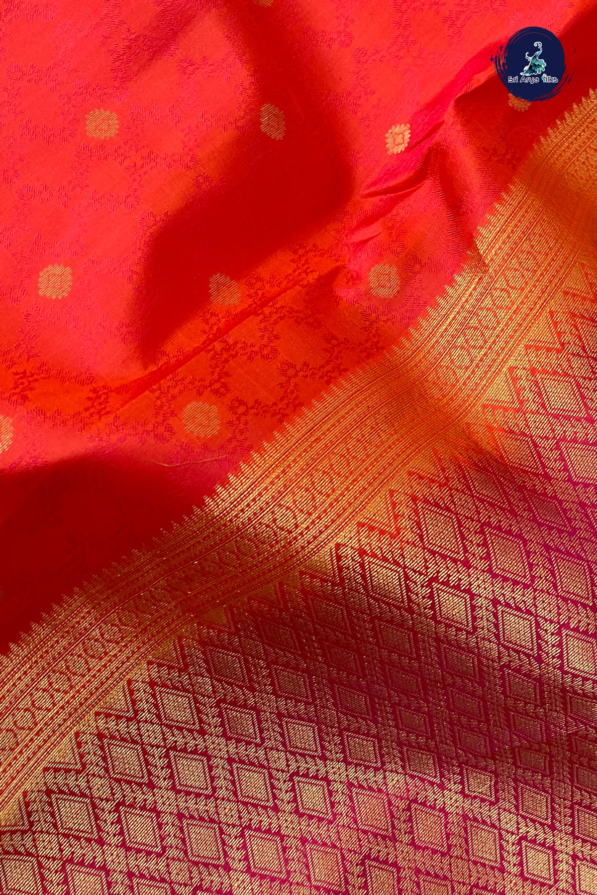 Pinkish Orange Bridal Silk Saree With Embossed Pattern