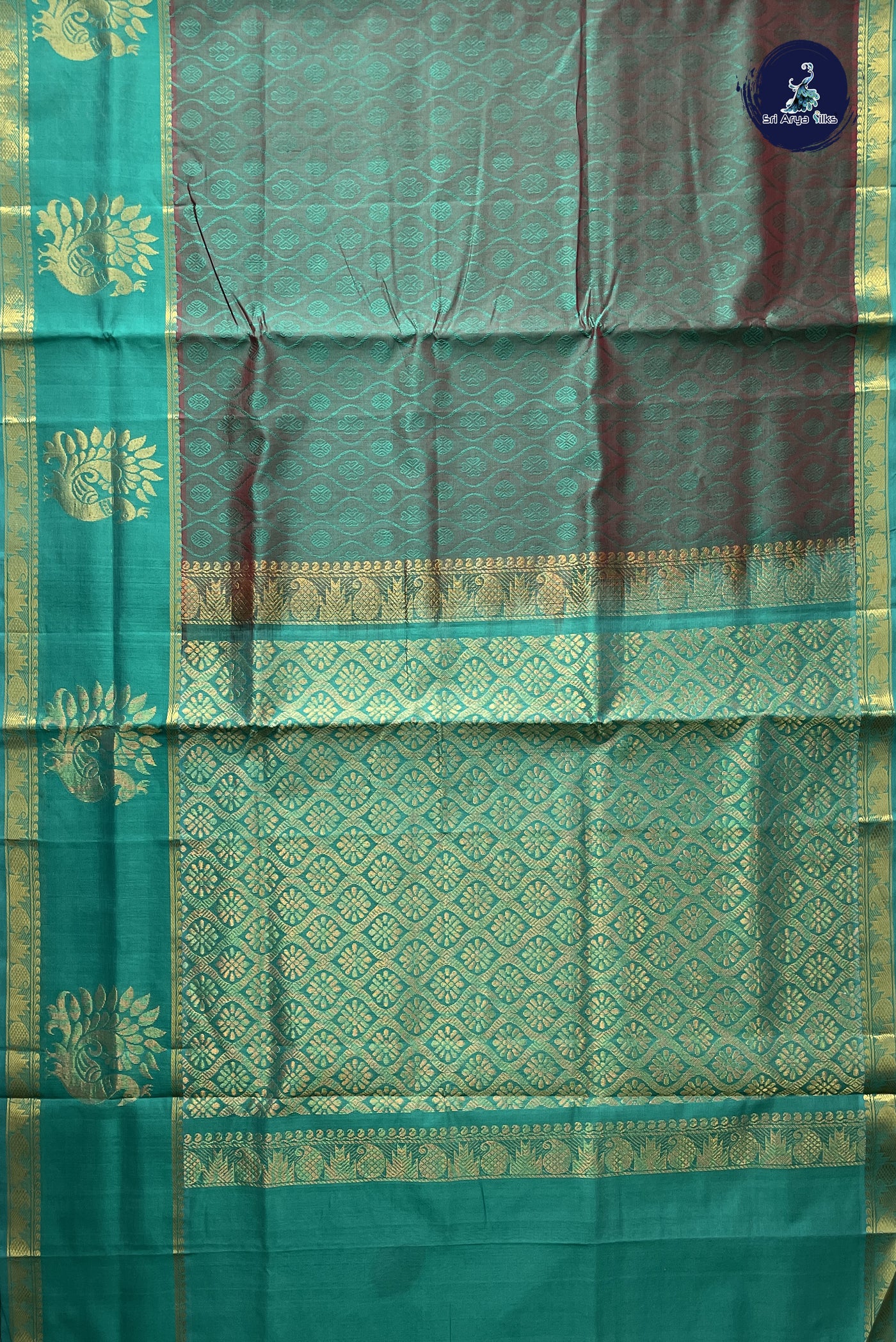 Dual Tone Green Bridal Silk Cotton Saree With Embossed Pattern