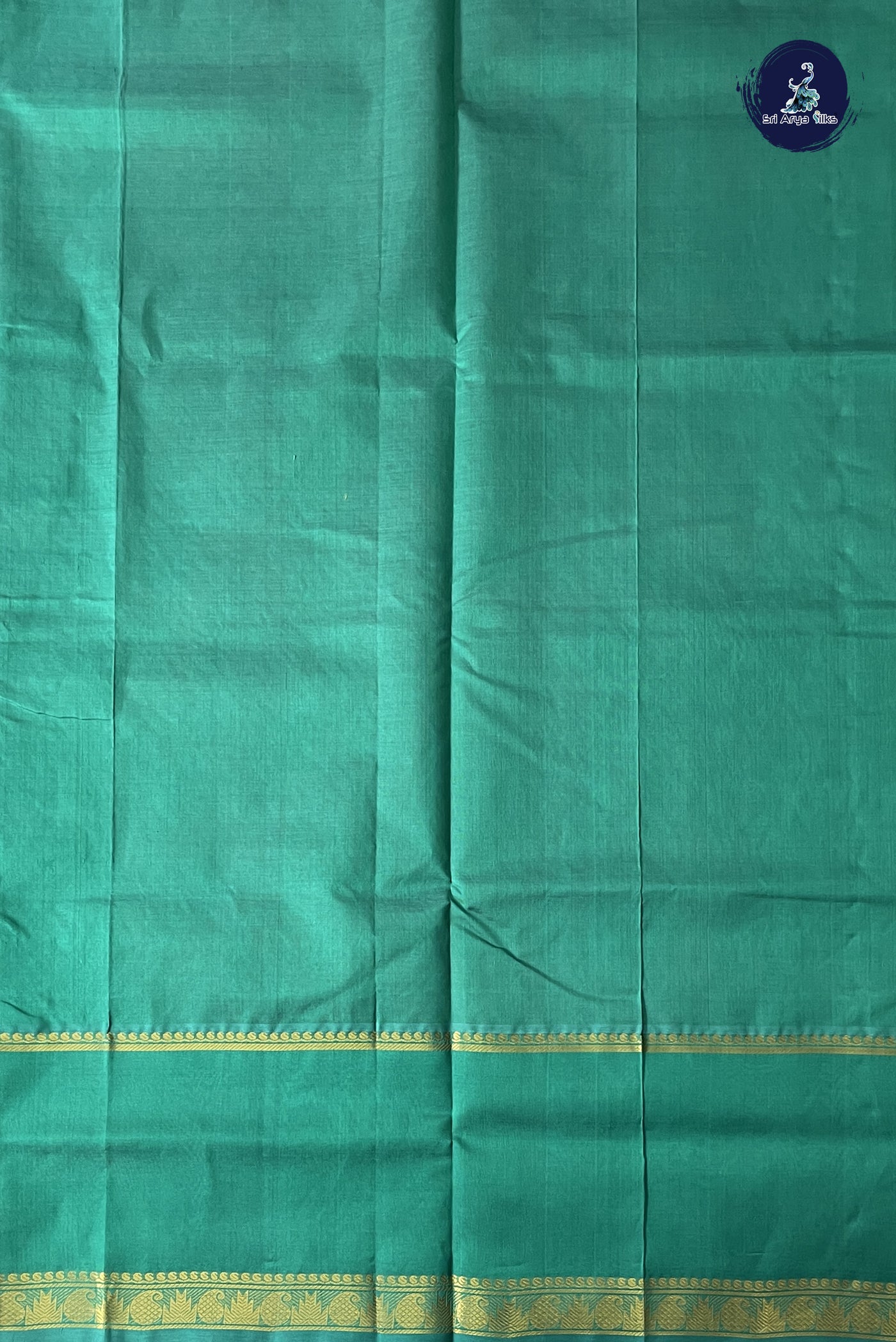 Dual Tone Green Bridal Silk Cotton Saree With Embossed Pattern