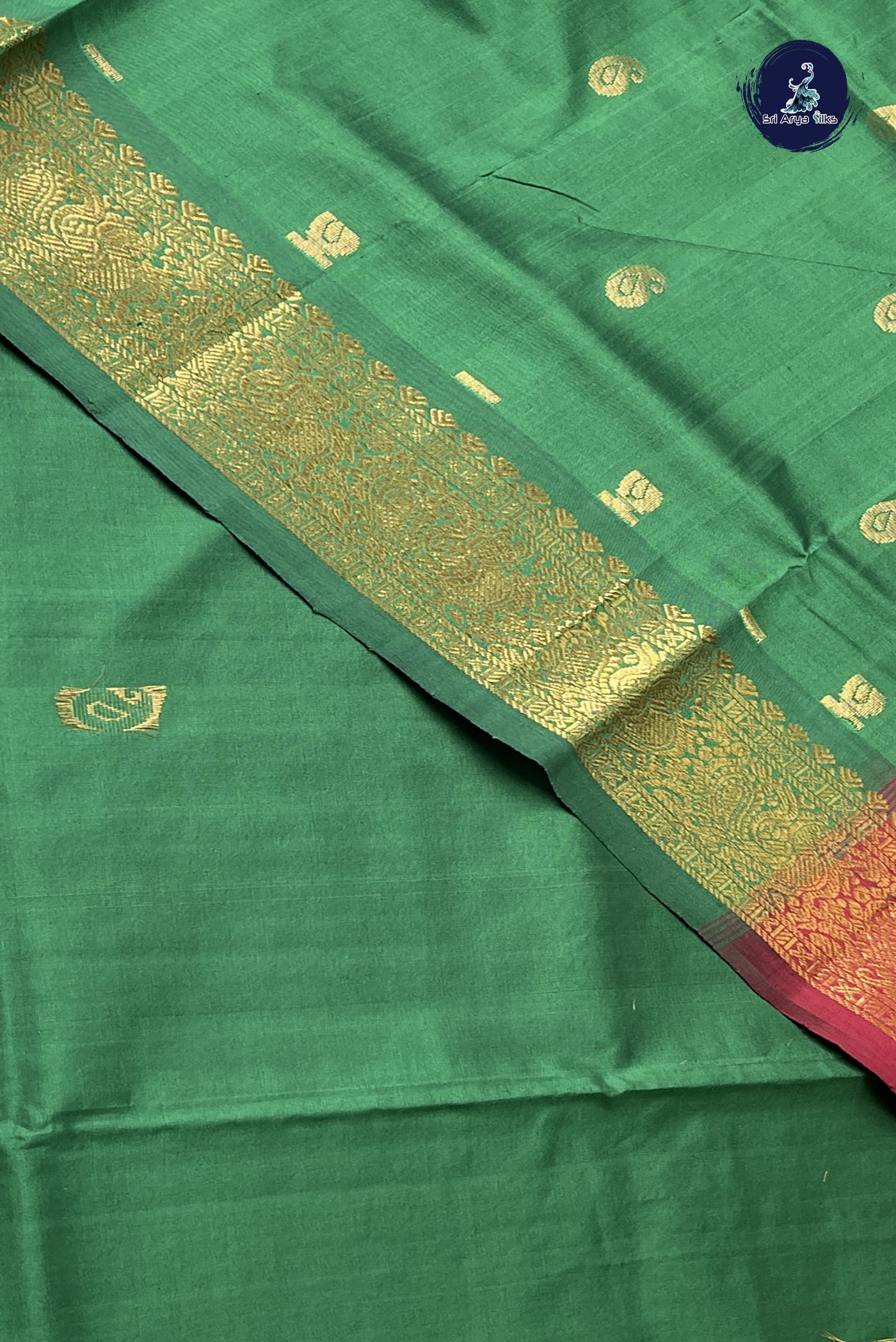 Bottle Green Simple Silk Cotton Saree With Zari Buttas Pattern