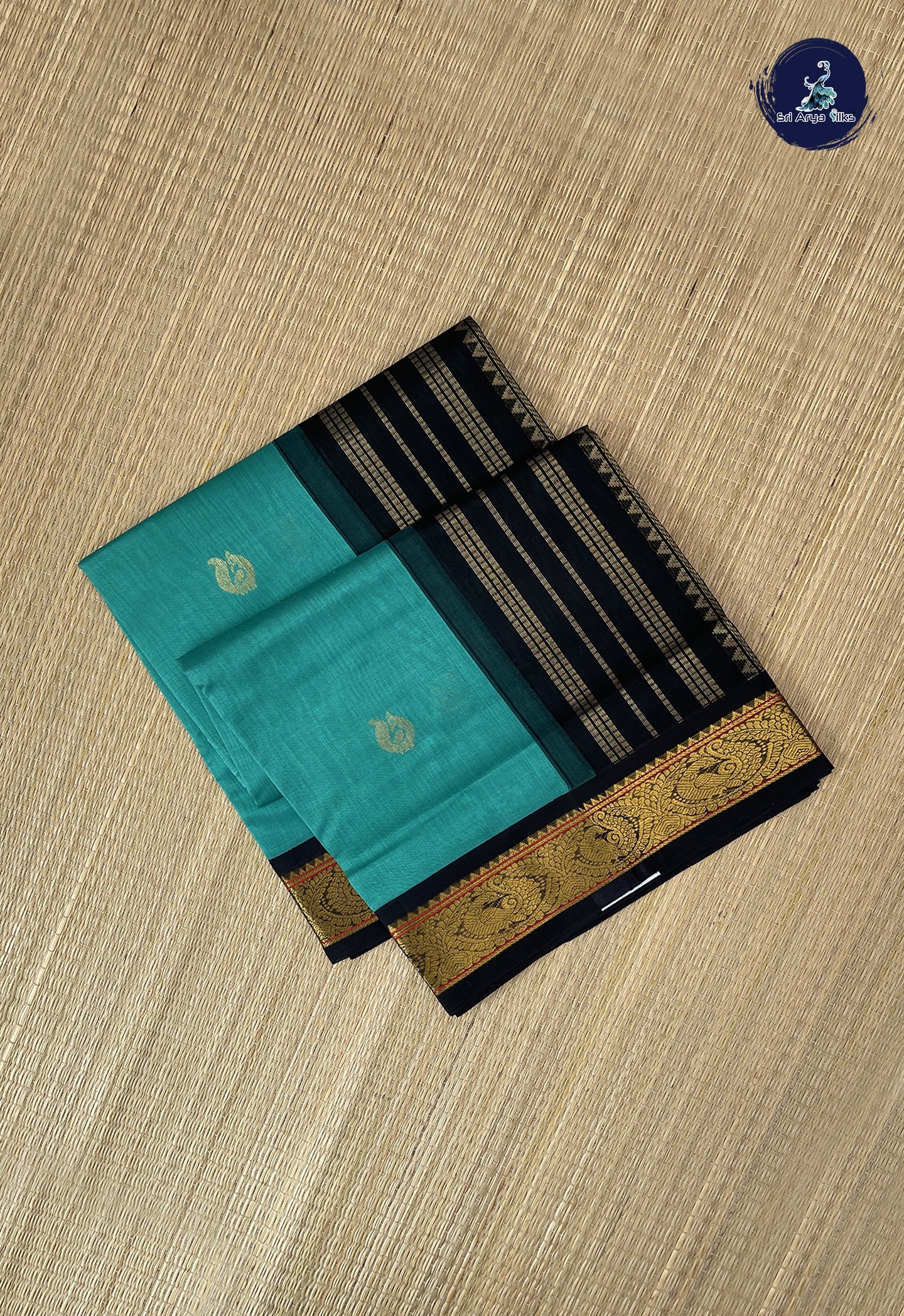 Teal Korvai Silk Cotton Saree With Zari Buttas Pattern