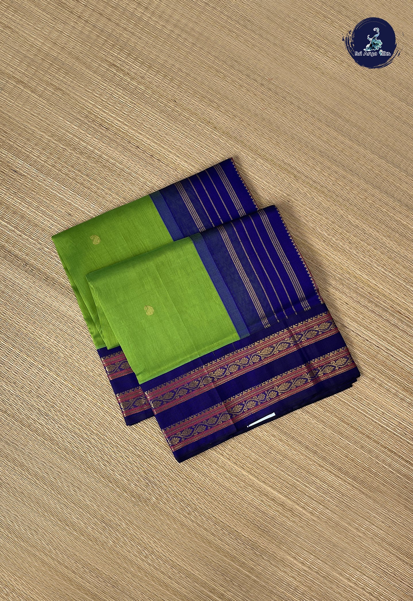 Parrot Green Korvai Silk Cotton Saree With Zari Buttas Pattern