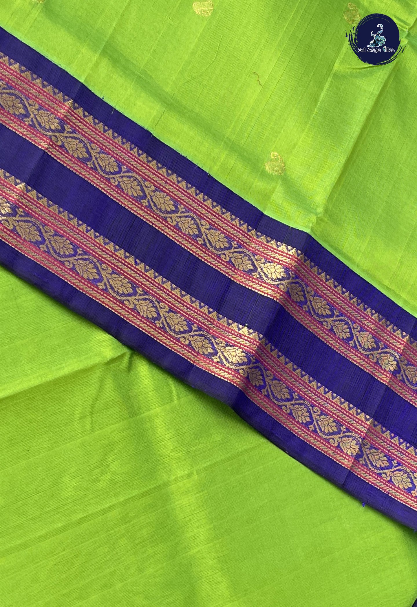 Parrot Green Korvai Silk Cotton Saree With Zari Buttas Pattern