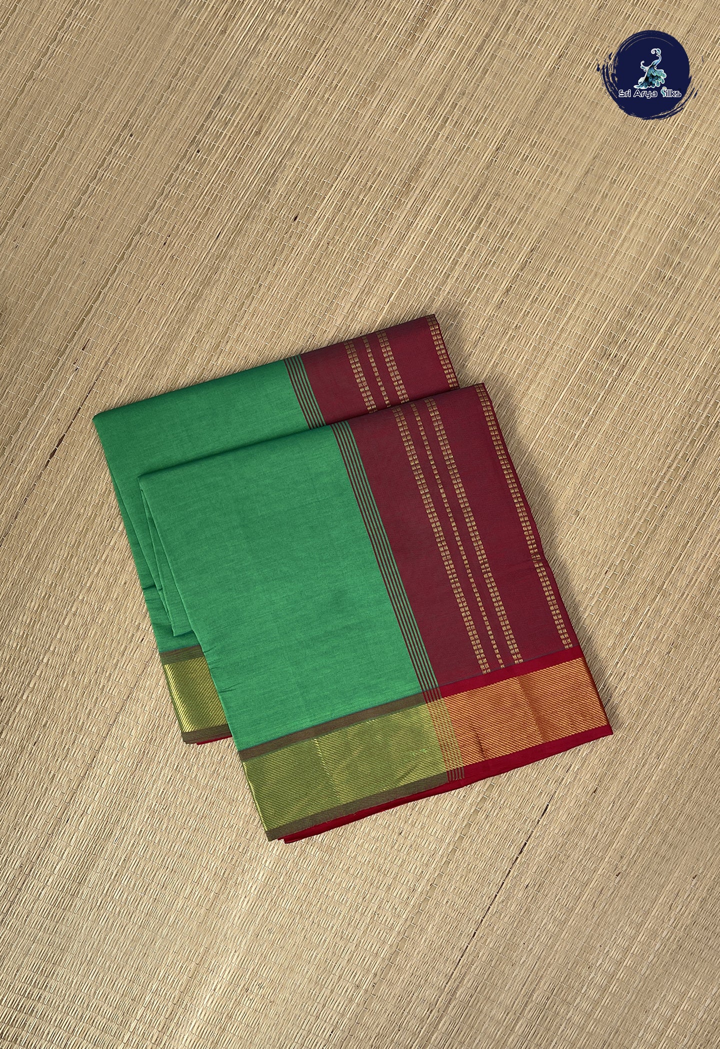 Green Semi Silk Cotton Saree With Plain Pattern