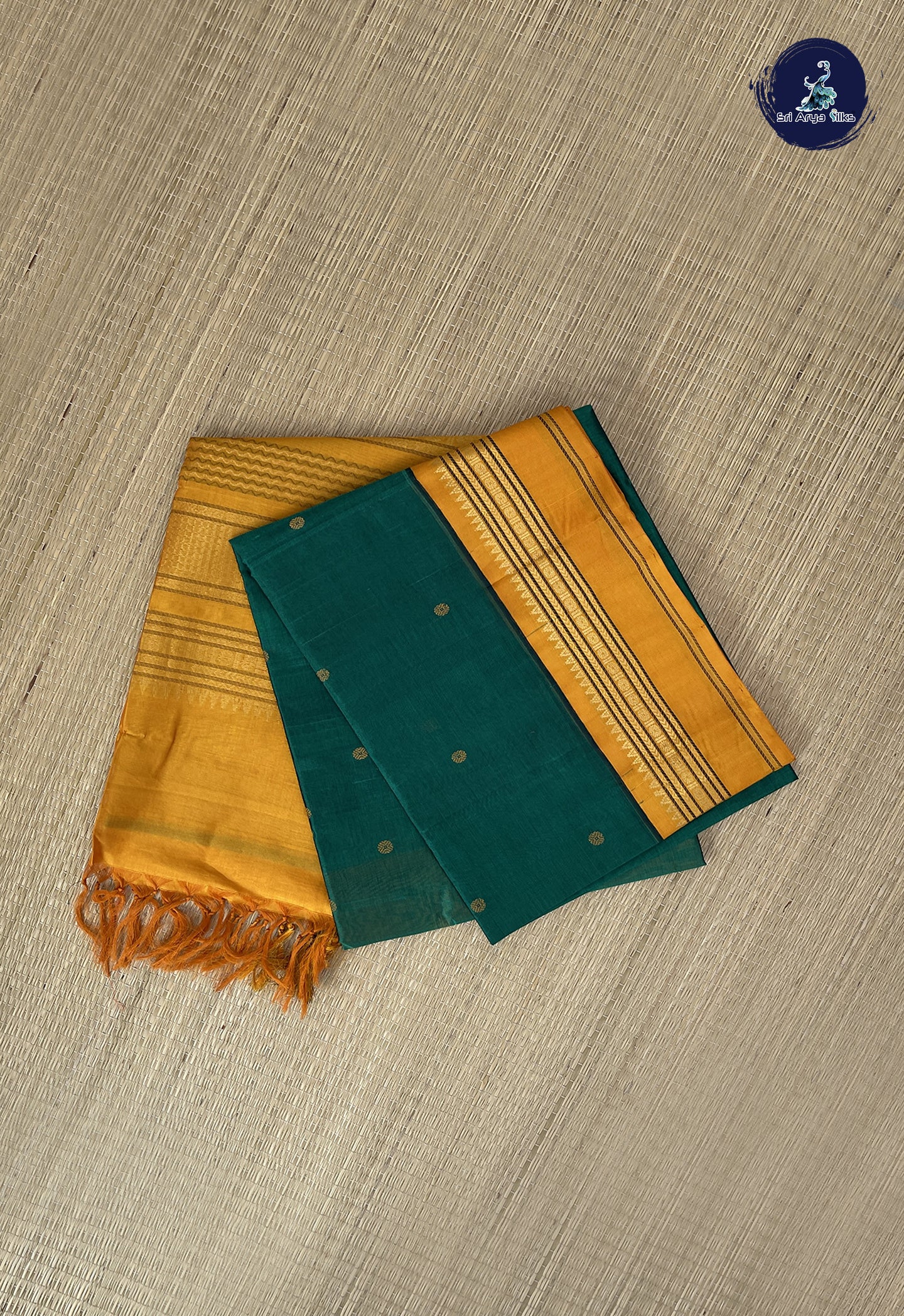 Dark Green Korvai Silk Cotton Saree With Buttas Pattern