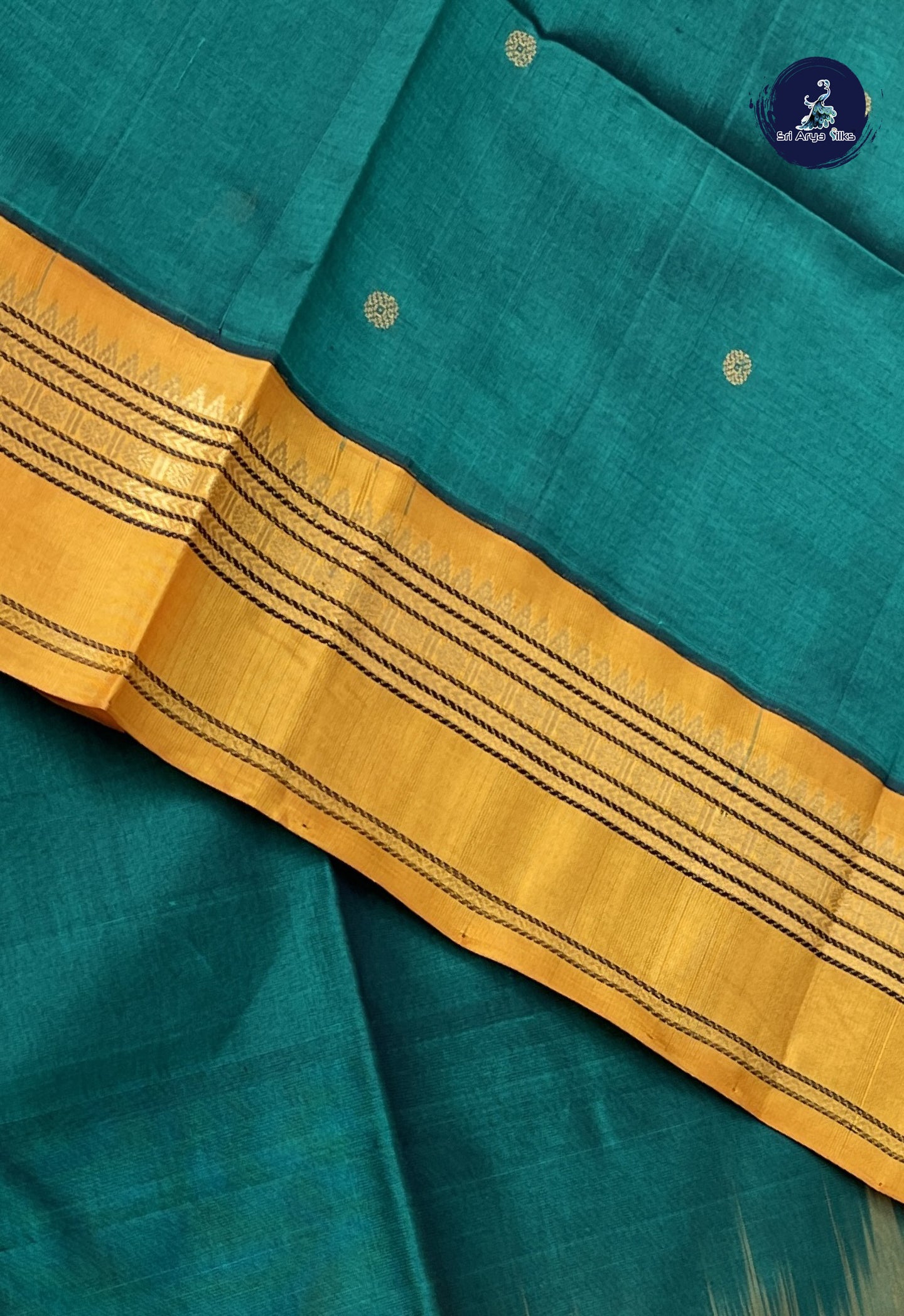 Dark Green Korvai Silk Cotton Saree With Buttas Pattern