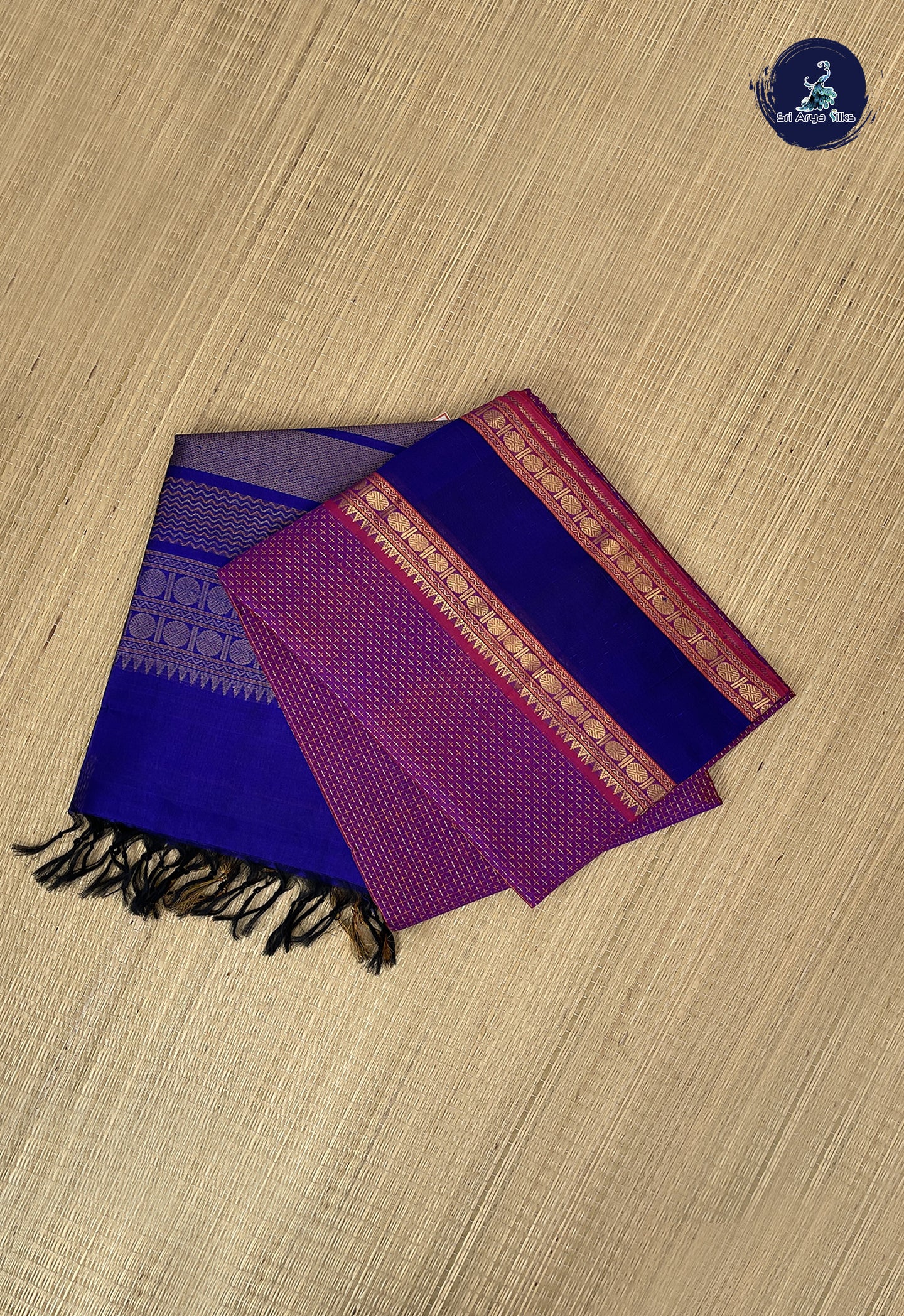 Dual Tone Purple Bridal Silk Cotton Saree With Embossed Pattern