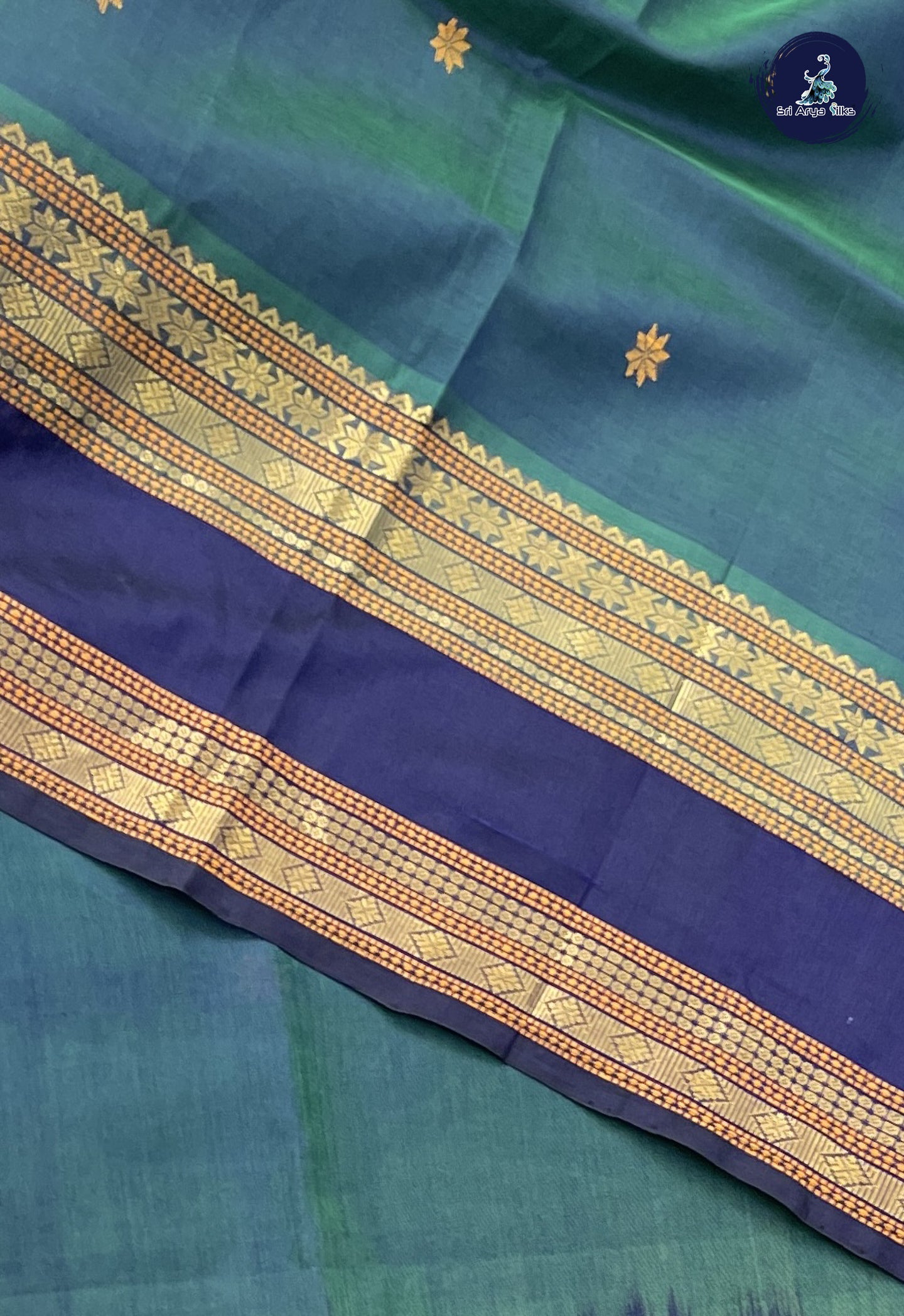 Dual Tone Green Bridal Silk Cotton Saree With Buttas Pattern