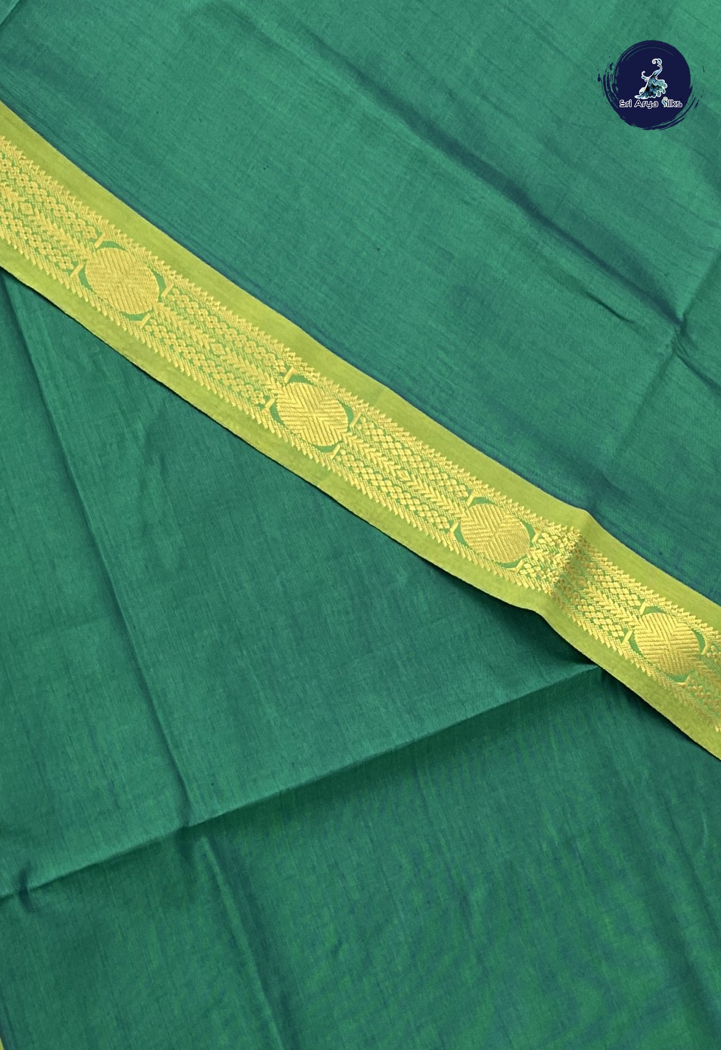 Green Kanchi Semi Silk Cotton Saree With Plain Pattern