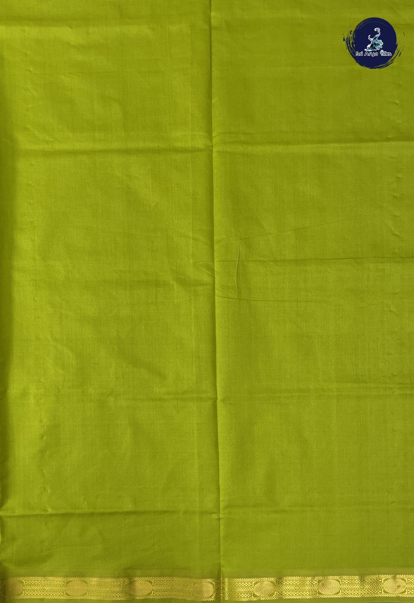 Green Kanchi Semi Silk Cotton Saree With Plain Pattern