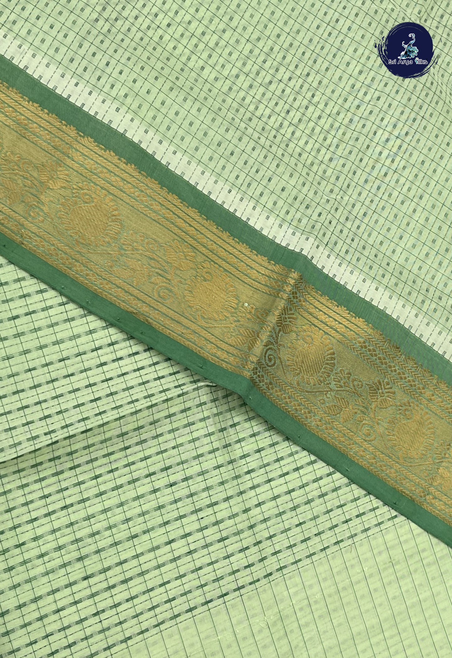 Pastel Green Checked Saree With Laksha Deepam Design Pattern