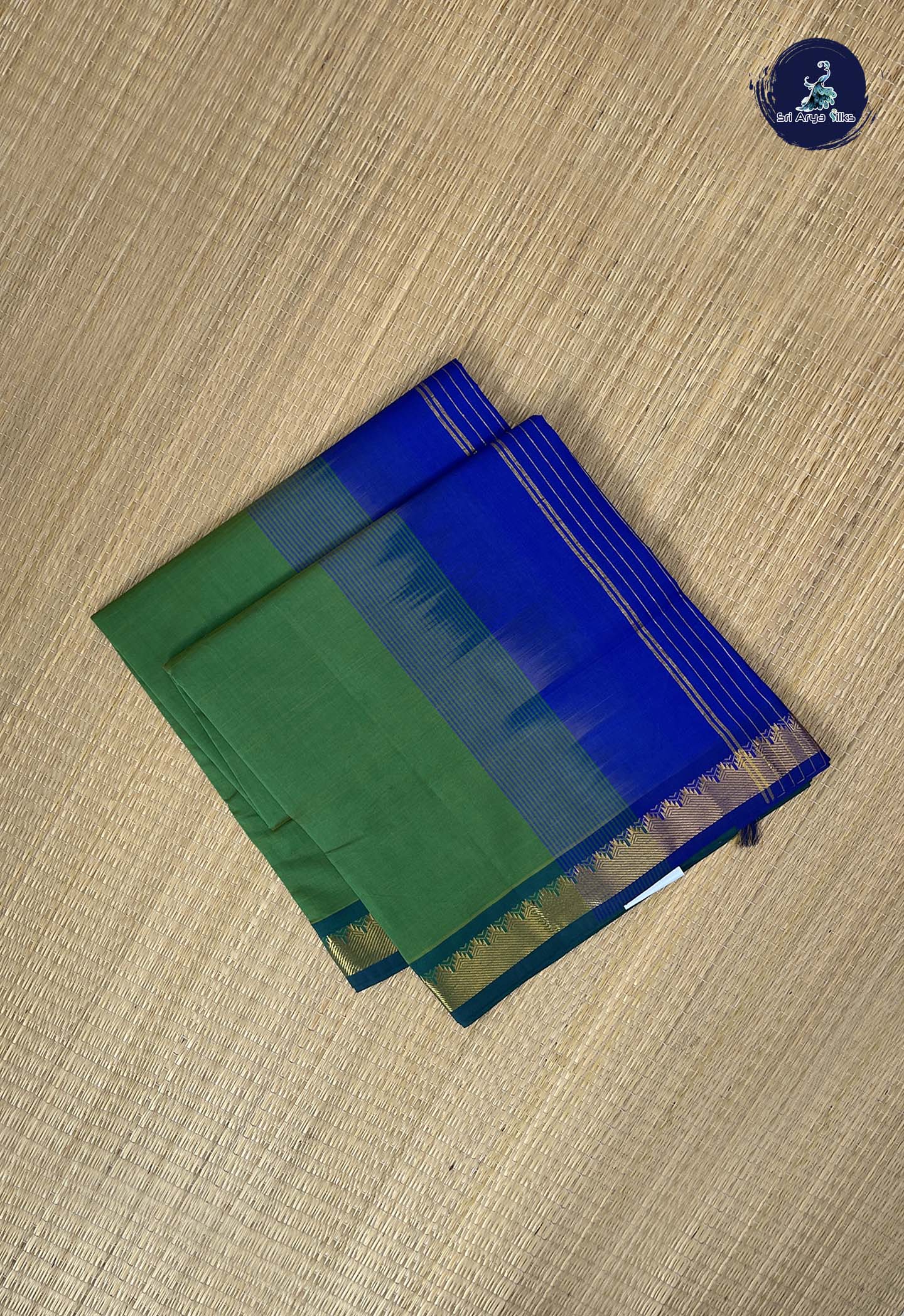 Green Kanchi Semi Silk Cotton Saree With Plain Pattern