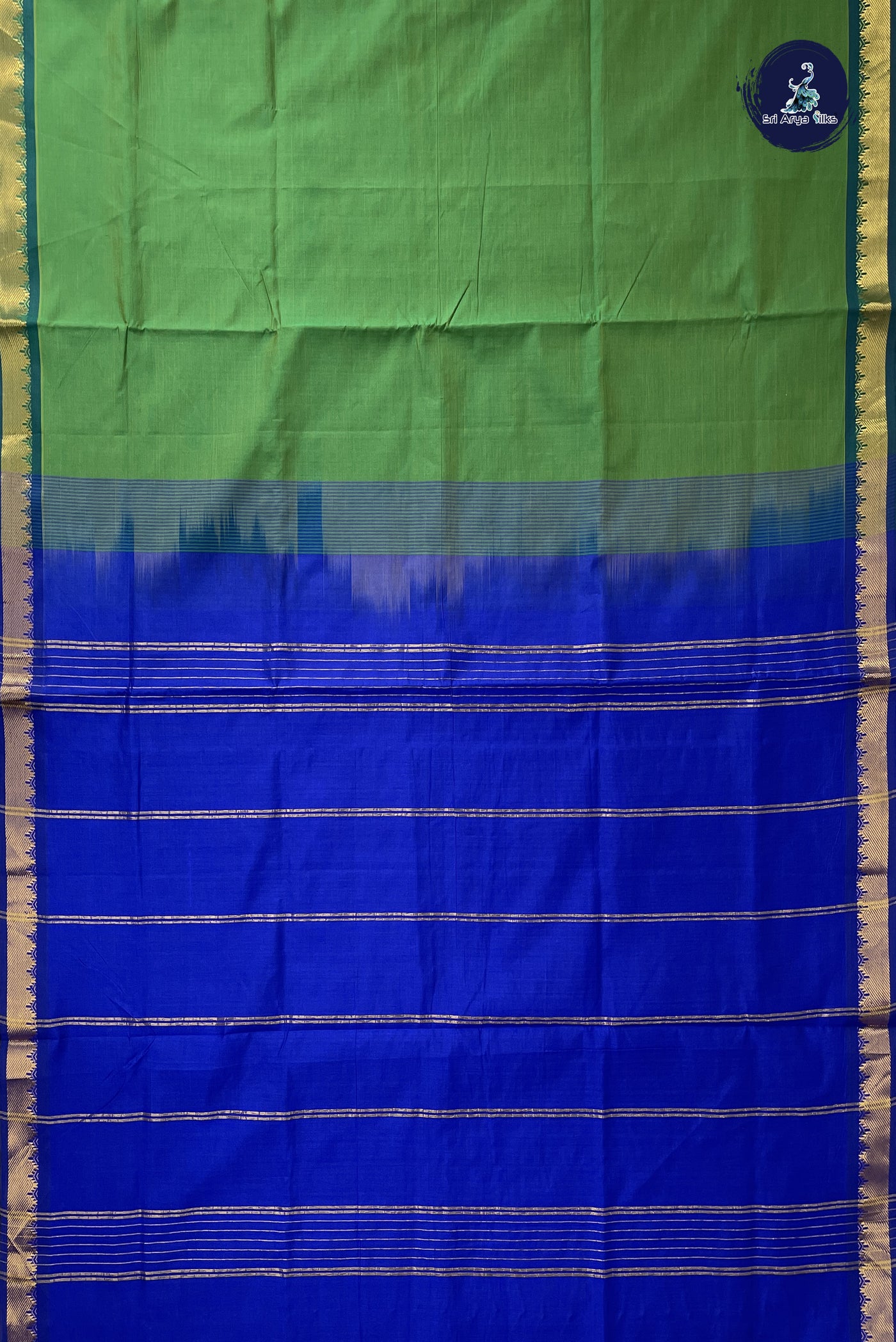 Green Kanchi Semi Silk Cotton Saree With Plain Pattern