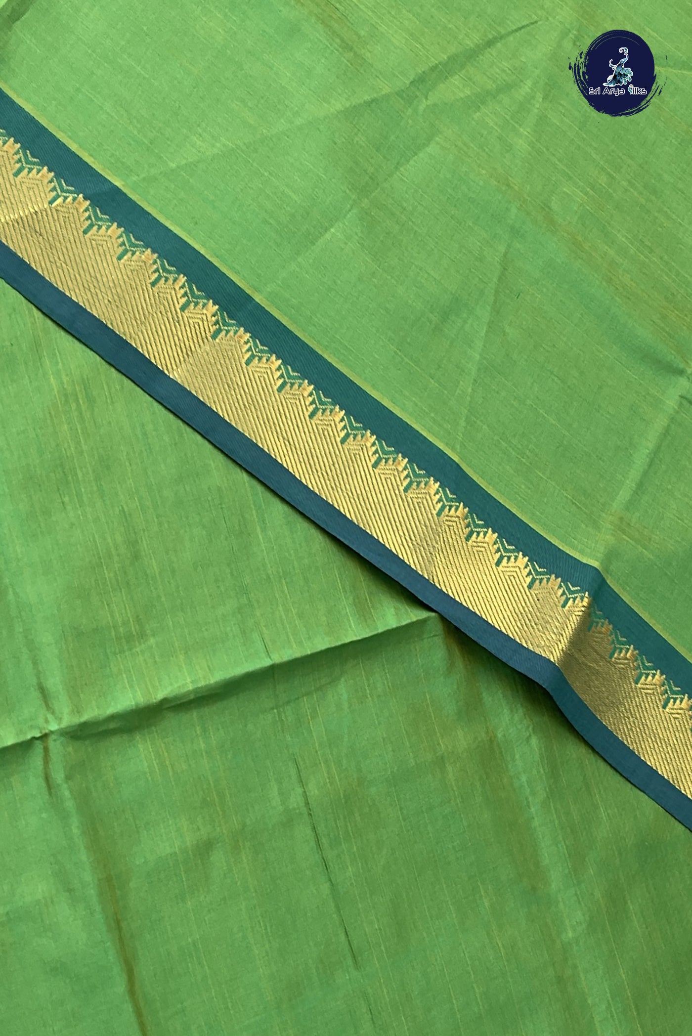 Green Kanchi Semi Silk Cotton Saree With Plain Pattern