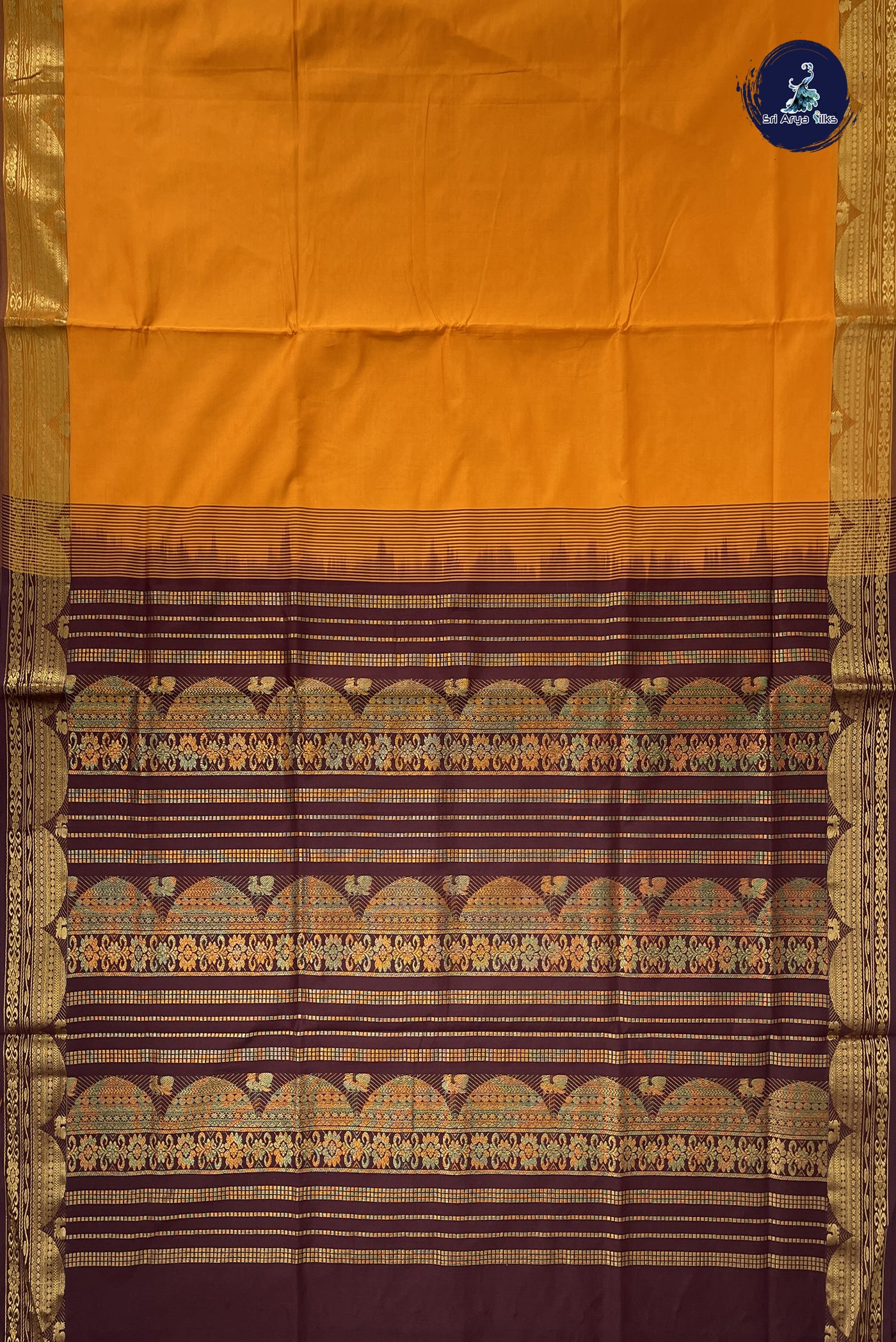 Turmeric Yellow Kanchi Semi Silk Cotton Saree With Plain Pattern