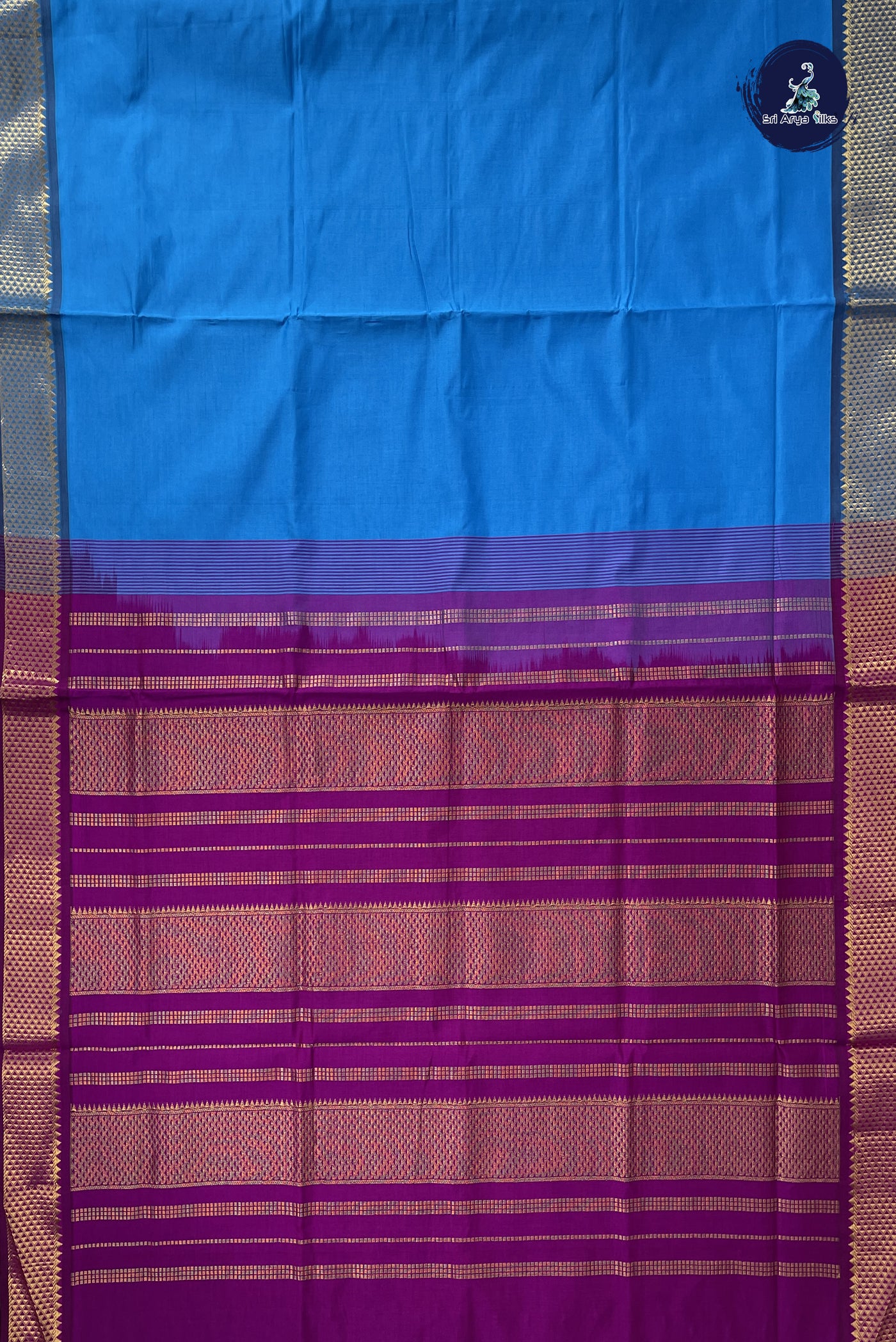 Copper Sulphate Blue Kanchi Semi Silk Cotton Saree With Plain Pattern
