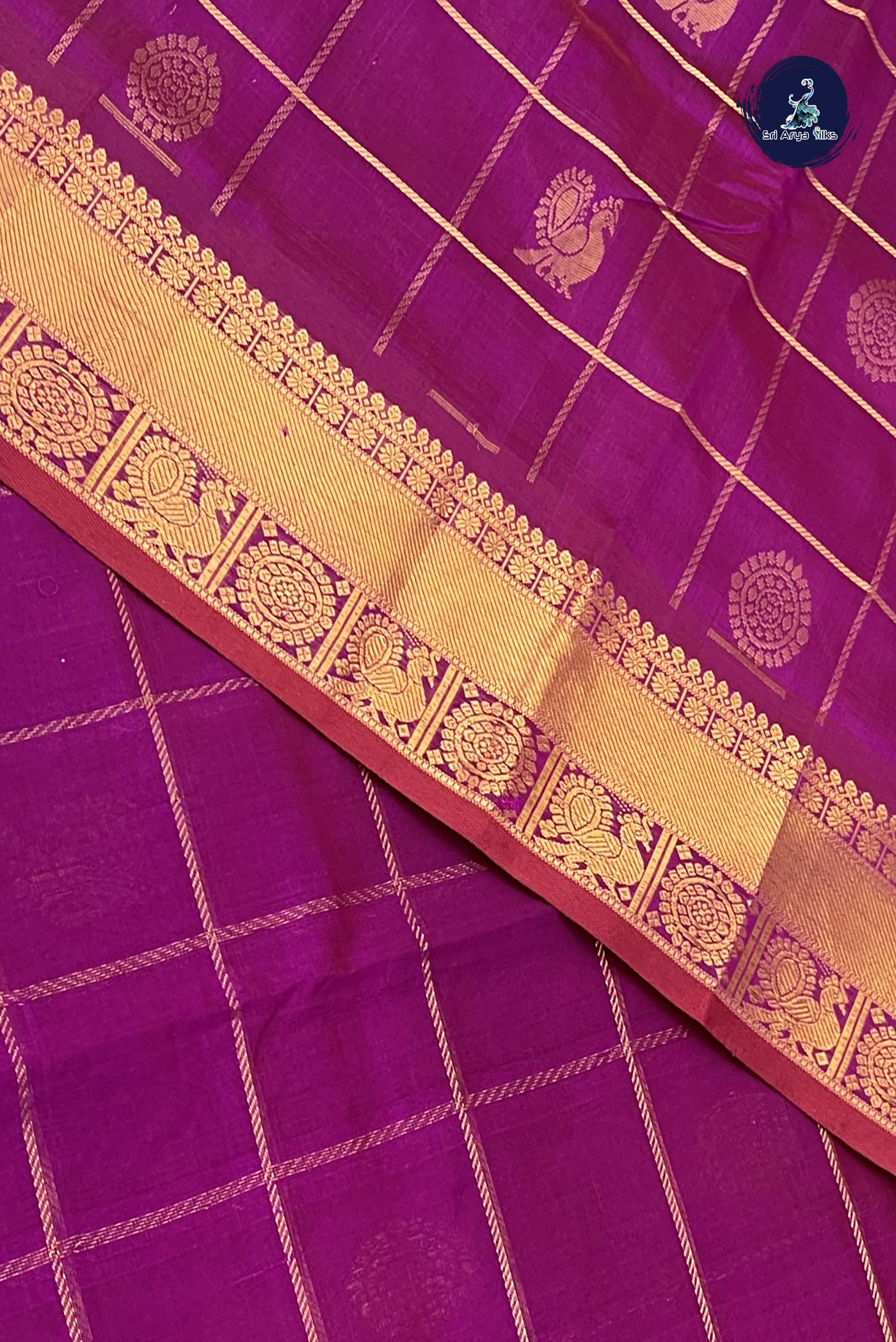 Purple Checked Saree With Mayil Chakram Butta Pattern
