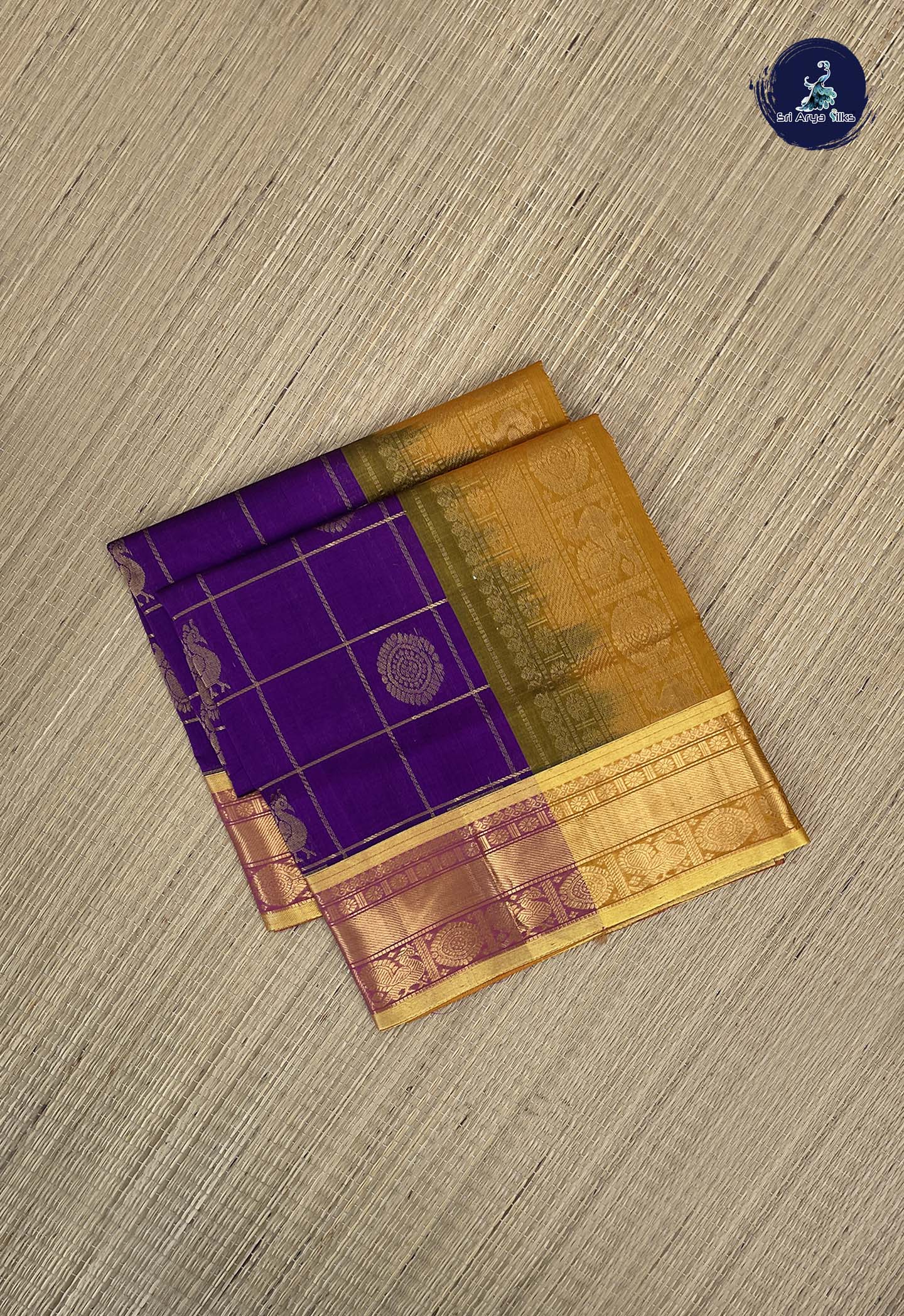 Dark Violet Checked Saree With Mayil Chakram Butta Pattern