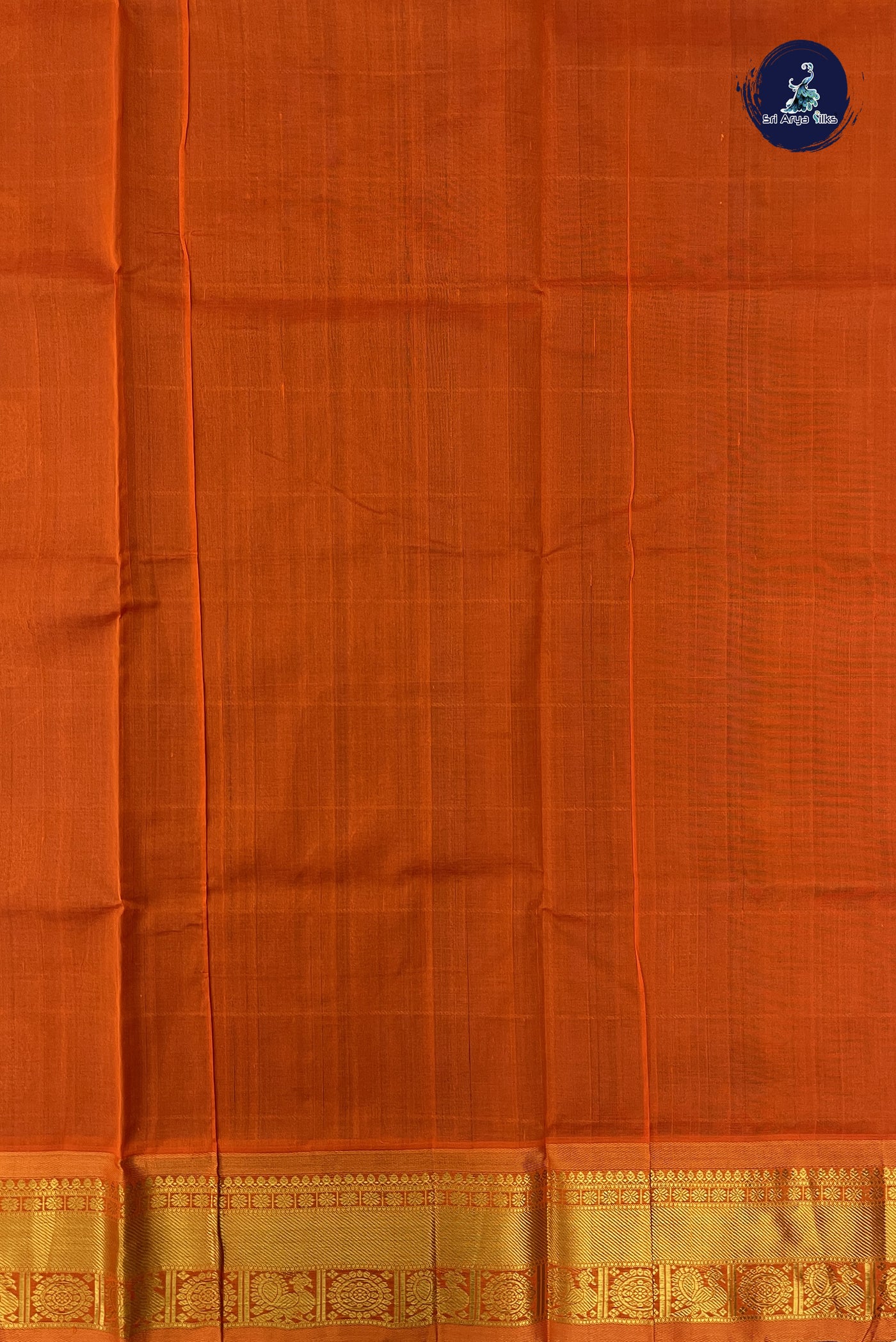 Greenish Blue Checked Saree With Mayil Chakram Butta Pattern