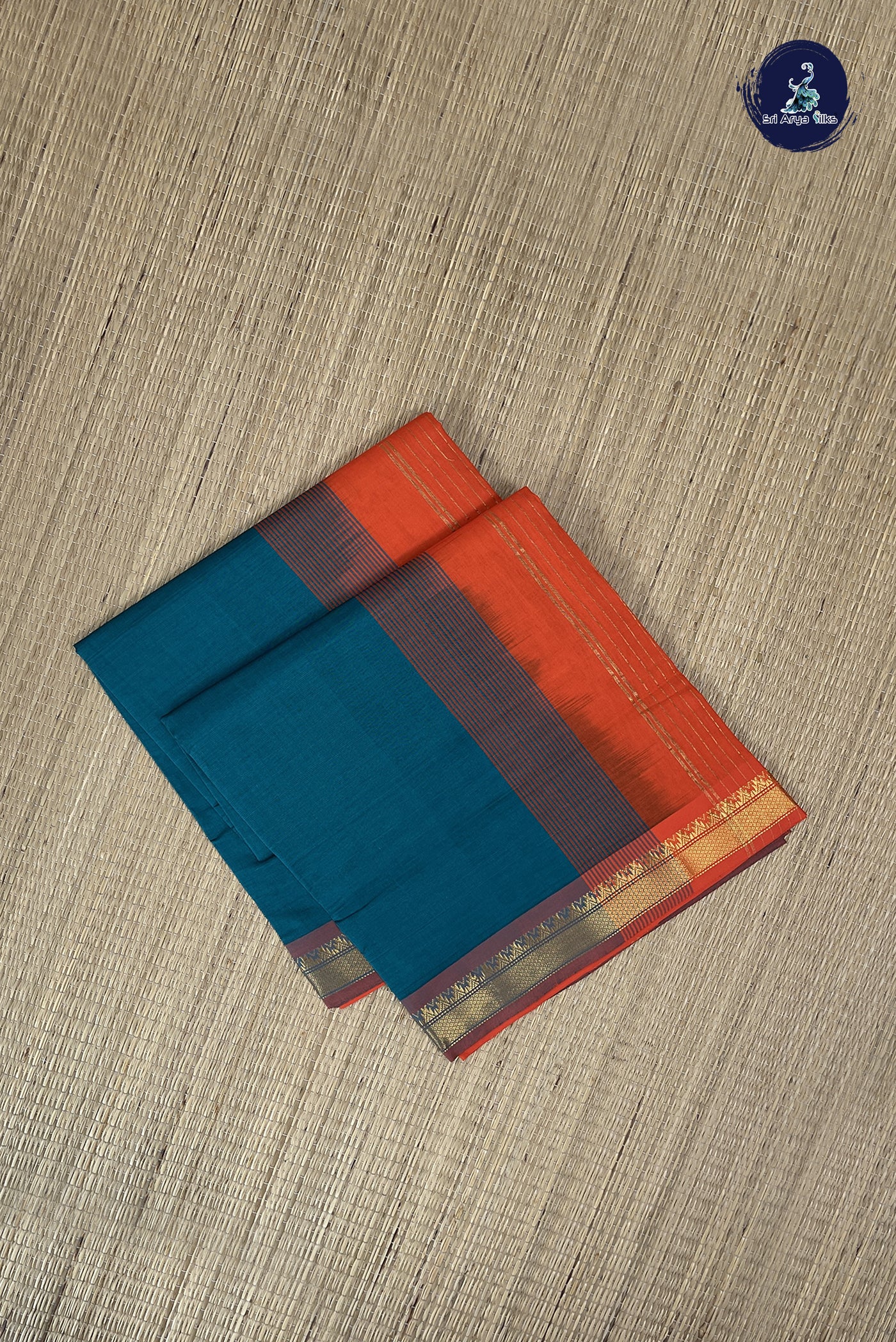 Peacock Green Kanchi Semi Silk Cotton Saree With Plain Pattern