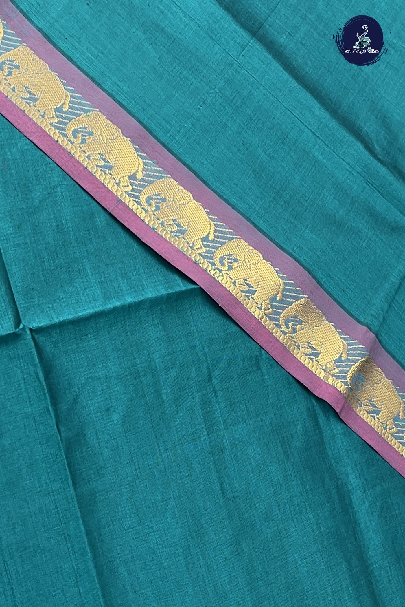Peacock Green Kanchi Semi Silk Cotton Saree With Plain Pattern