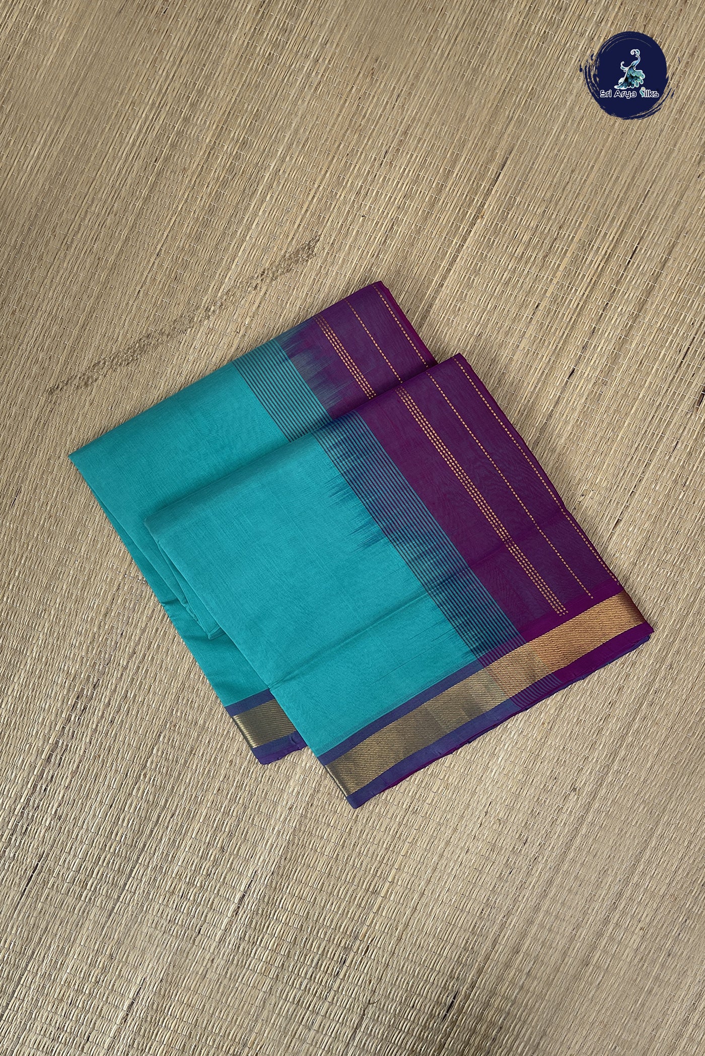 Teal Simple Silk Cotton Saree With Plain Pattern