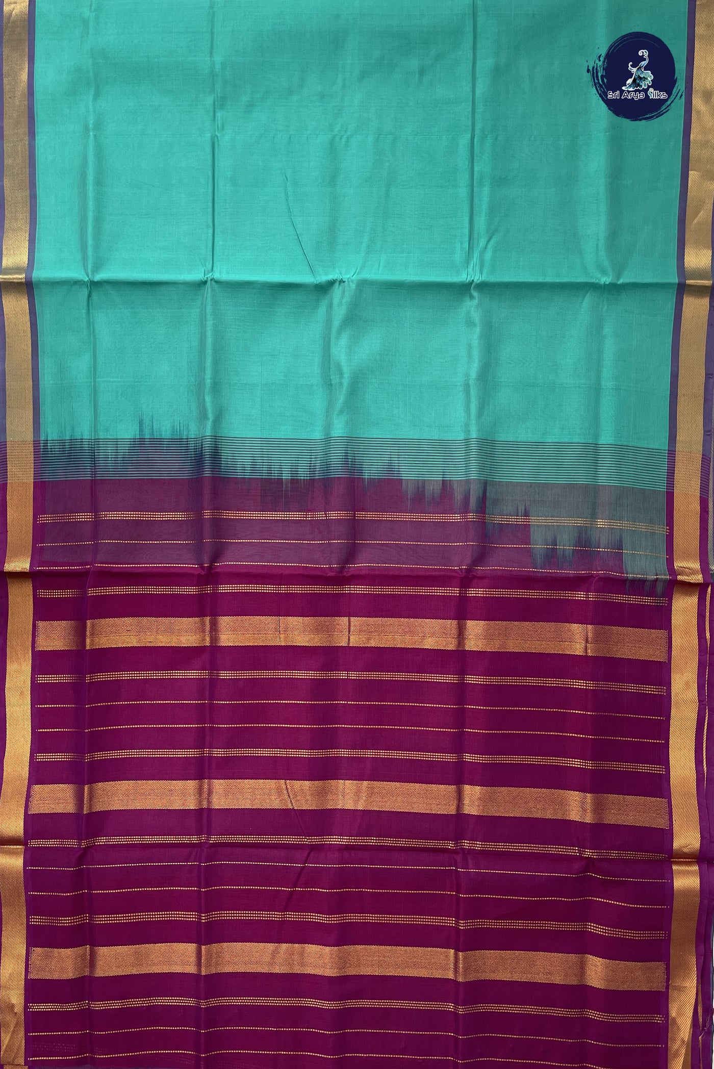 Teal Simple Silk Cotton Saree With Plain Pattern