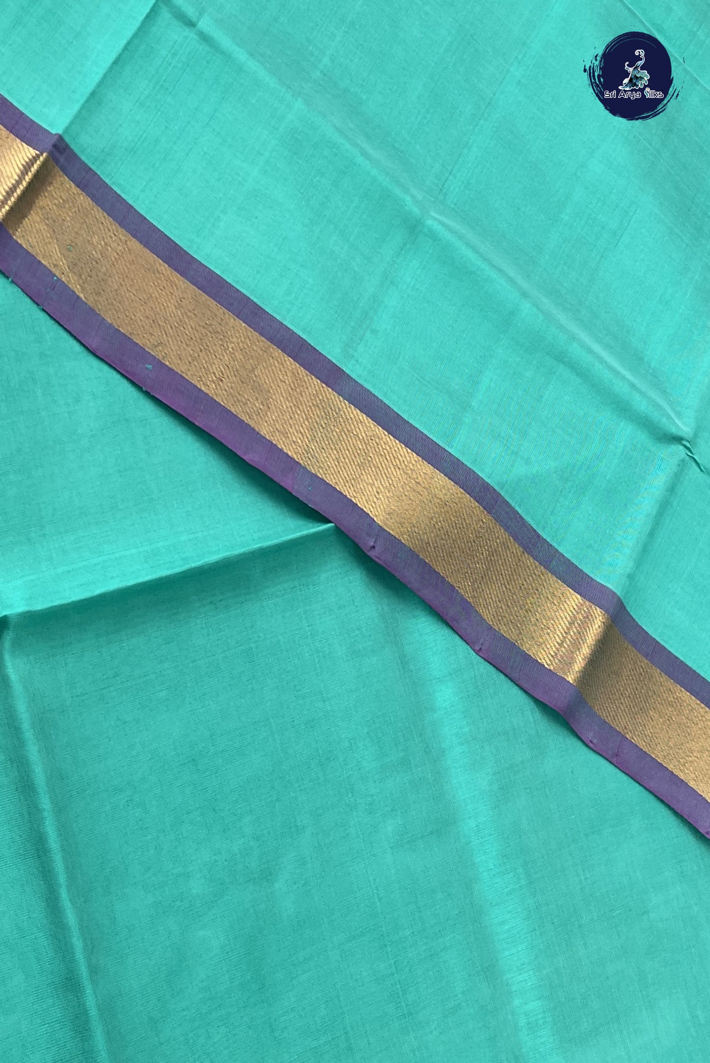 Teal Simple Silk Cotton Saree With Plain Pattern