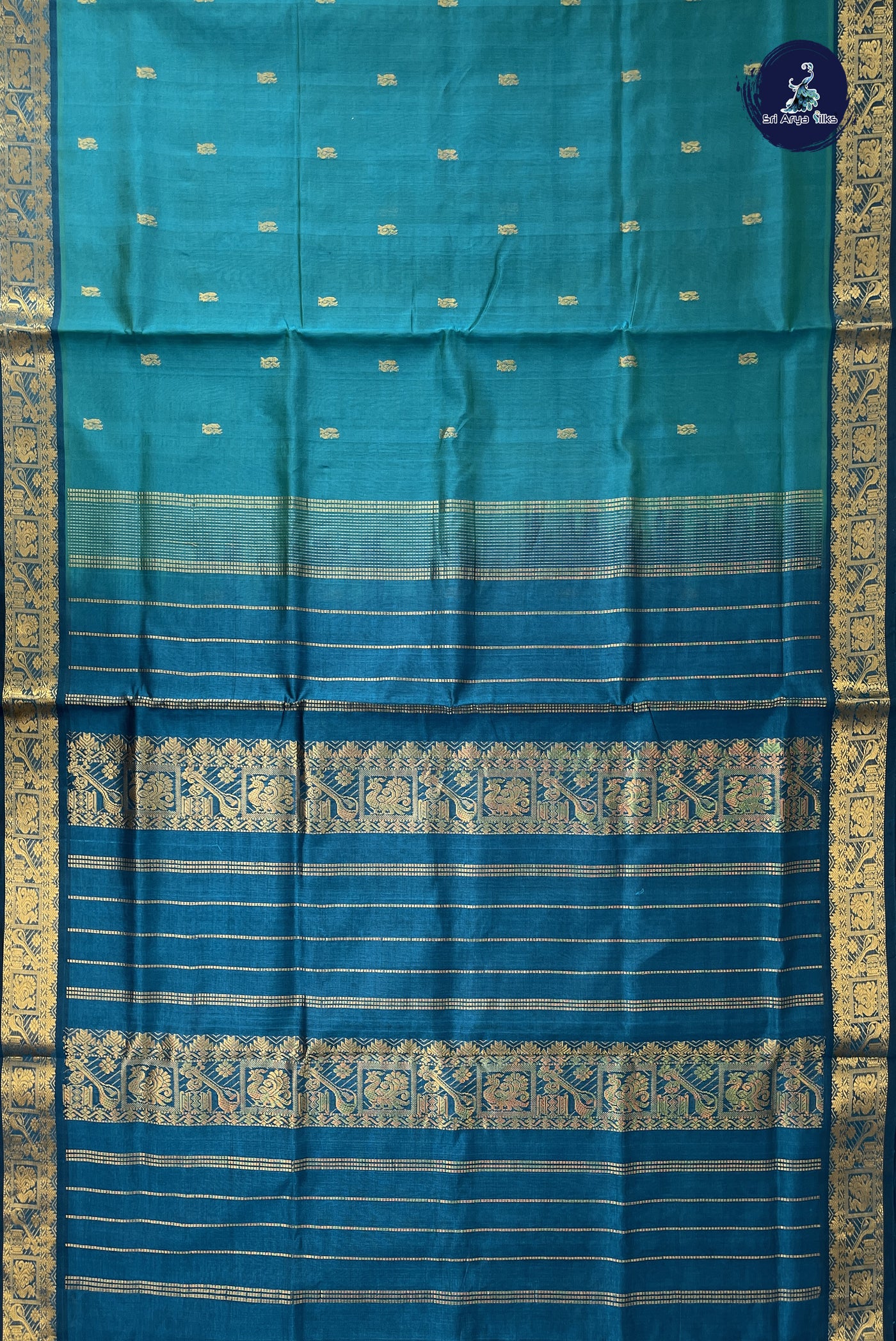 Peacock Blue Simple Silk Cotton Saree With Zari Buttas Pattern
