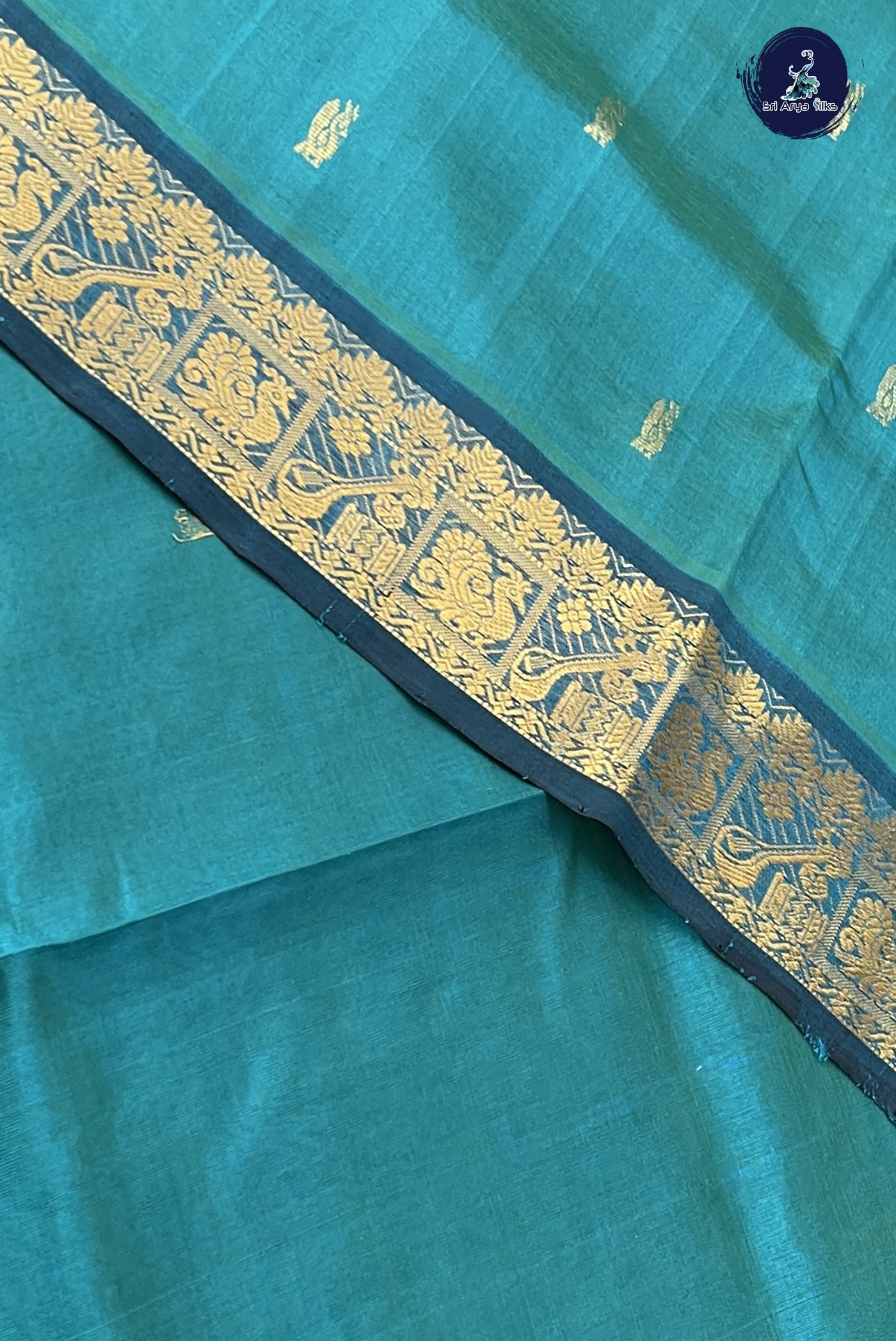 Peacock Blue Simple Silk Cotton Saree With Zari Buttas Pattern