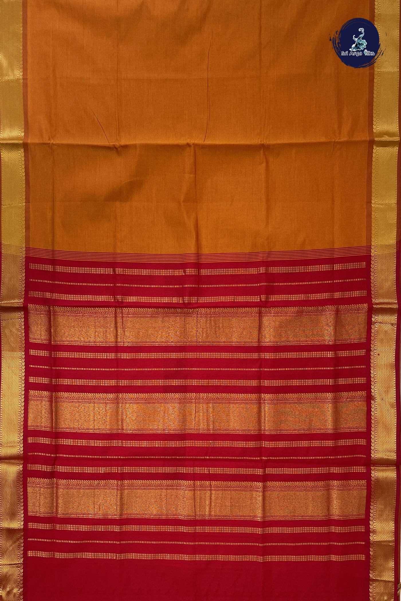 Lite Mustard Orange Kanchi Semi Silk Cotton Saree With Plain Pattern