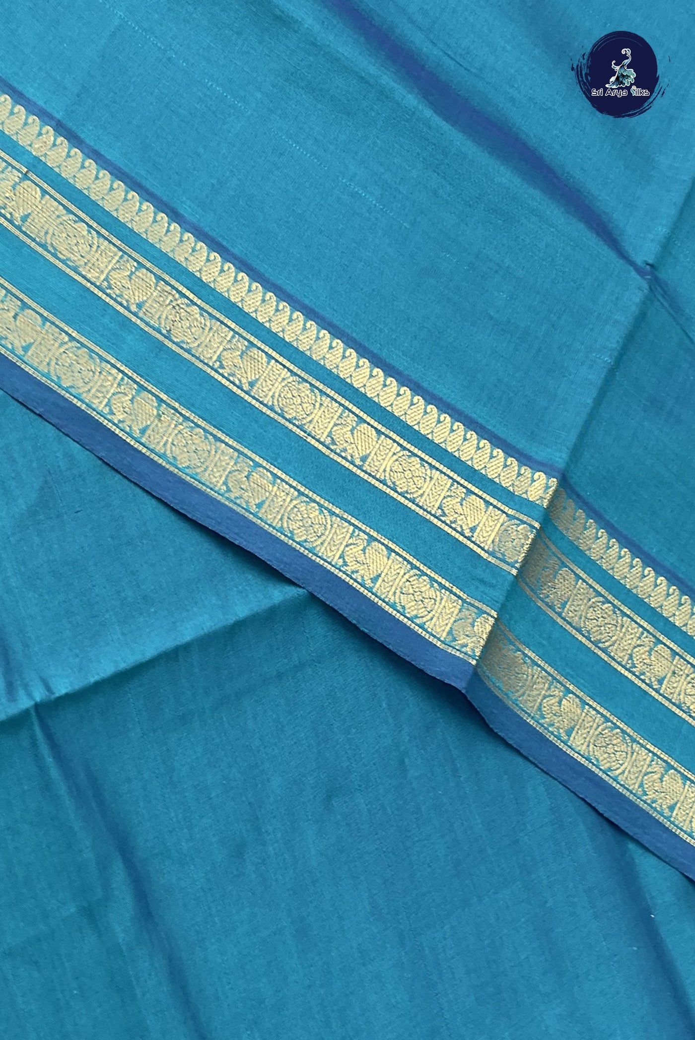 Peacock Green Kanchi Semi Silk Cotton Saree With Plain Pattern