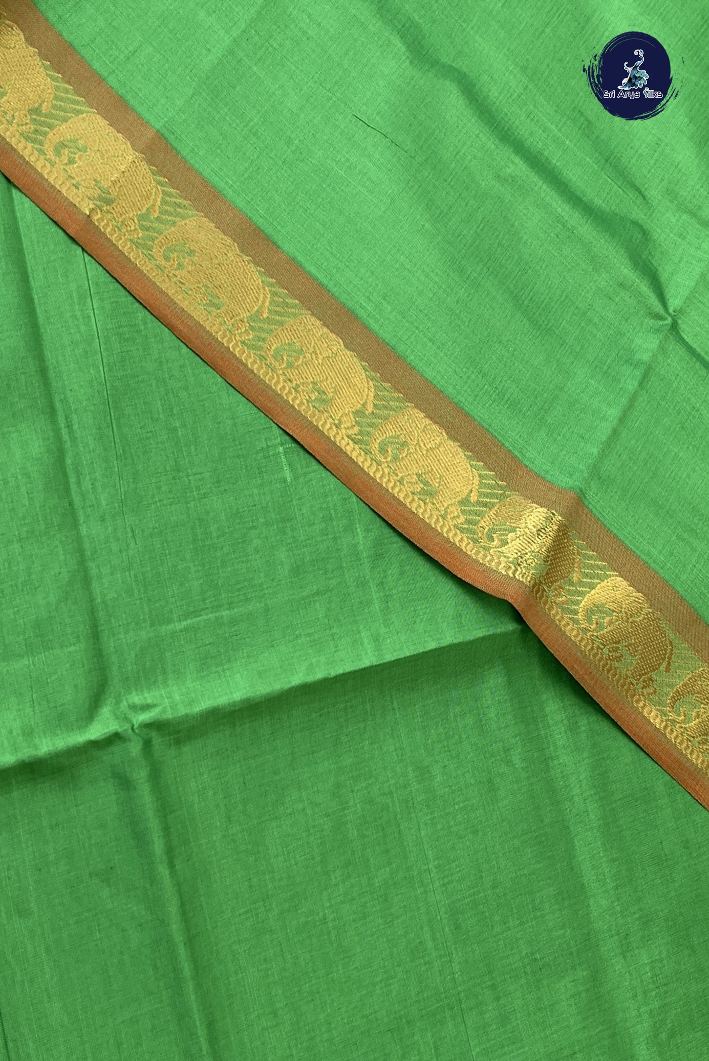 Parrot Green Kanchi Semi Silk Cotton Saree With Plain Pattern