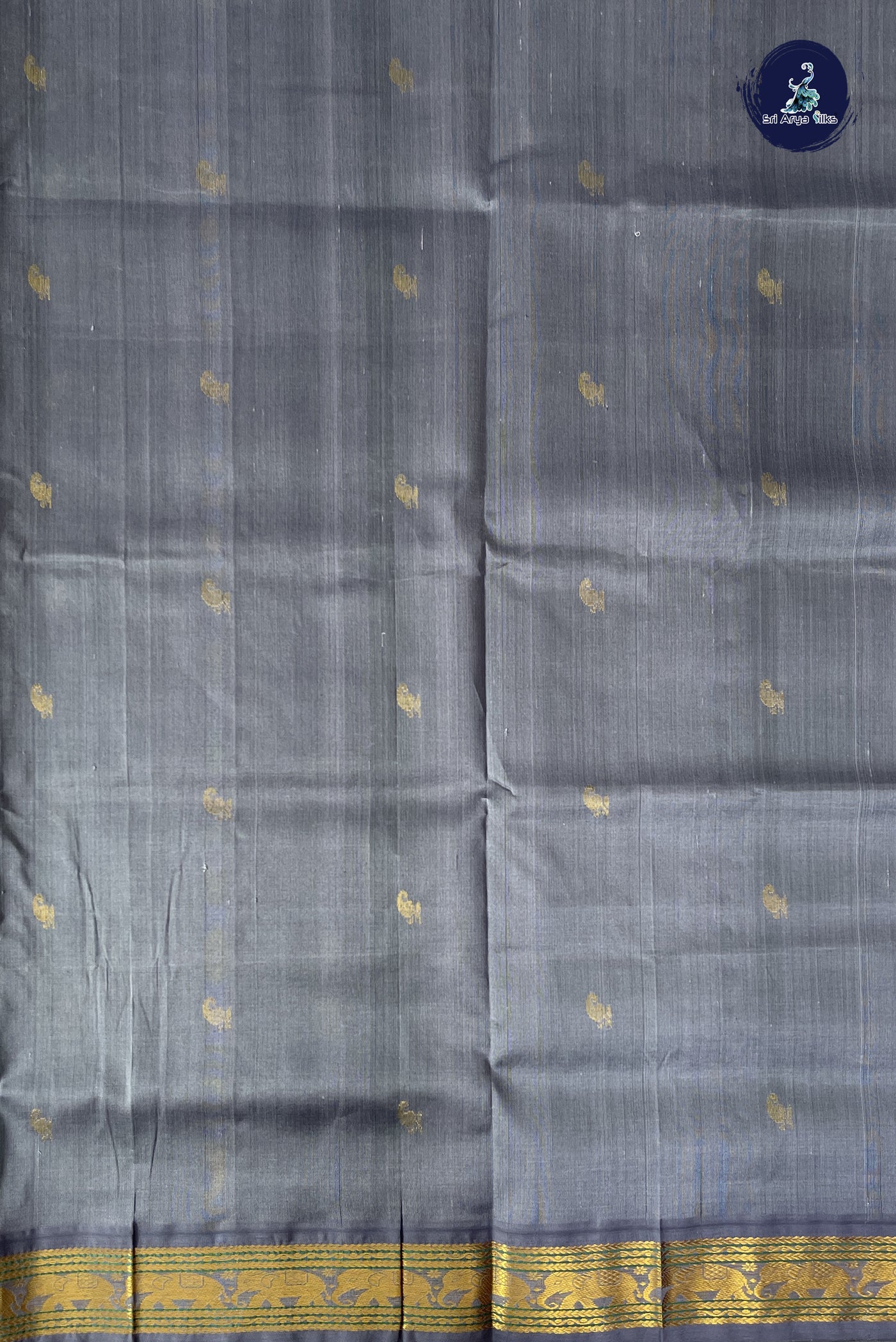 Bottle Green Korvai Silk Cotton Saree With Zari Buttas Pattern