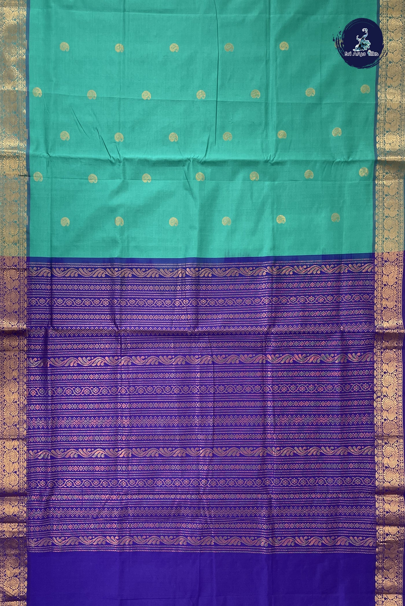Teal Kanchi Semi Silk Cotton Saree With Zari Buttas Pattern