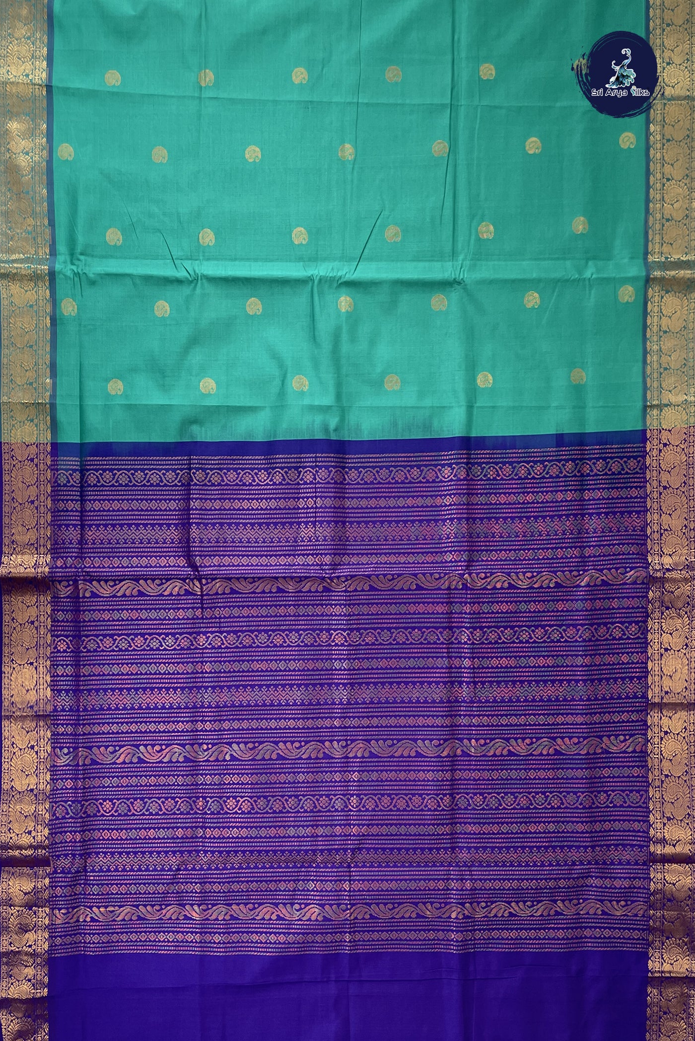 Teal Kanchi Semi Silk Cotton Saree With Zari Buttas Pattern