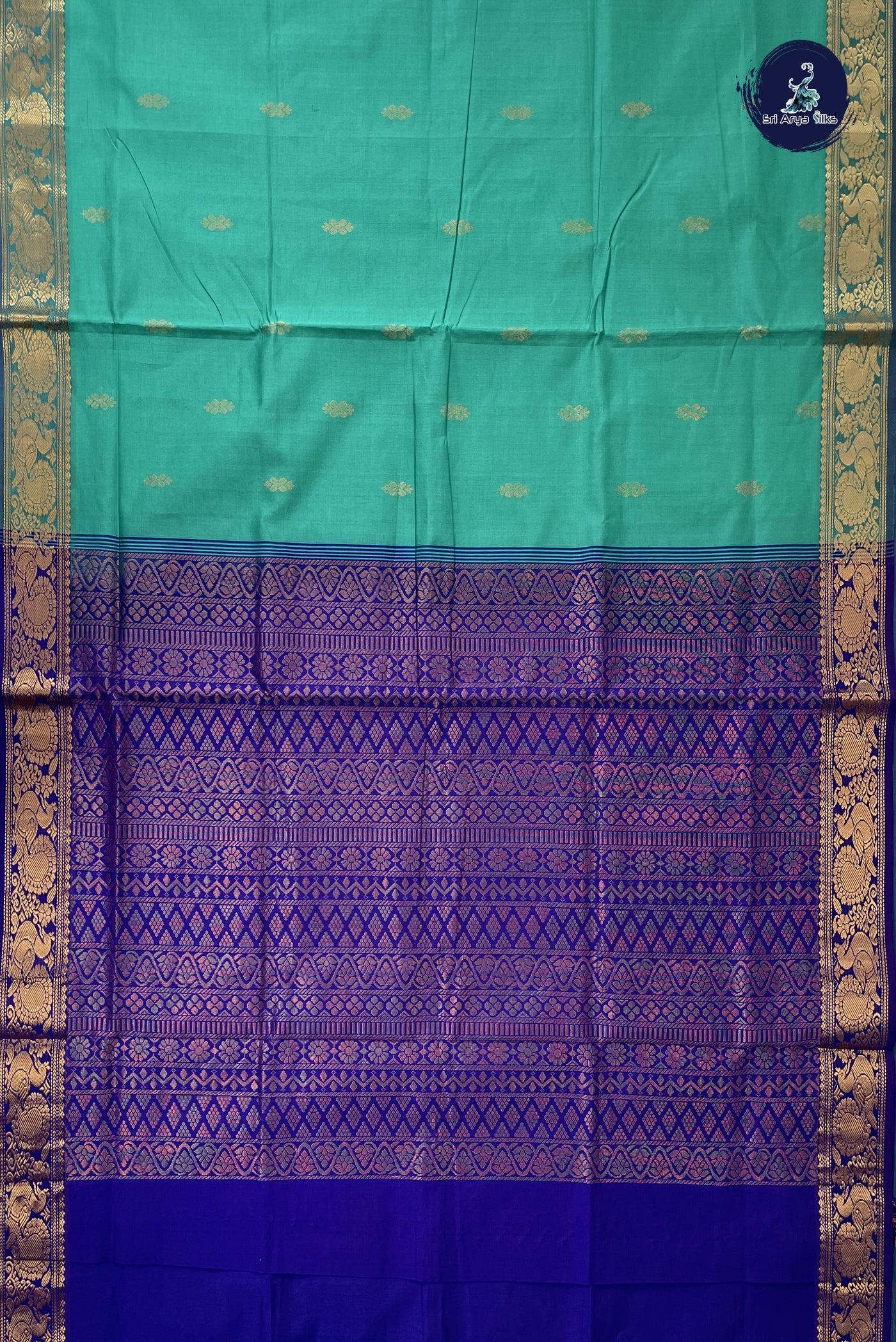 Teal Kanchi Semi Silk Cotton Saree With Zari Buttas Pattern