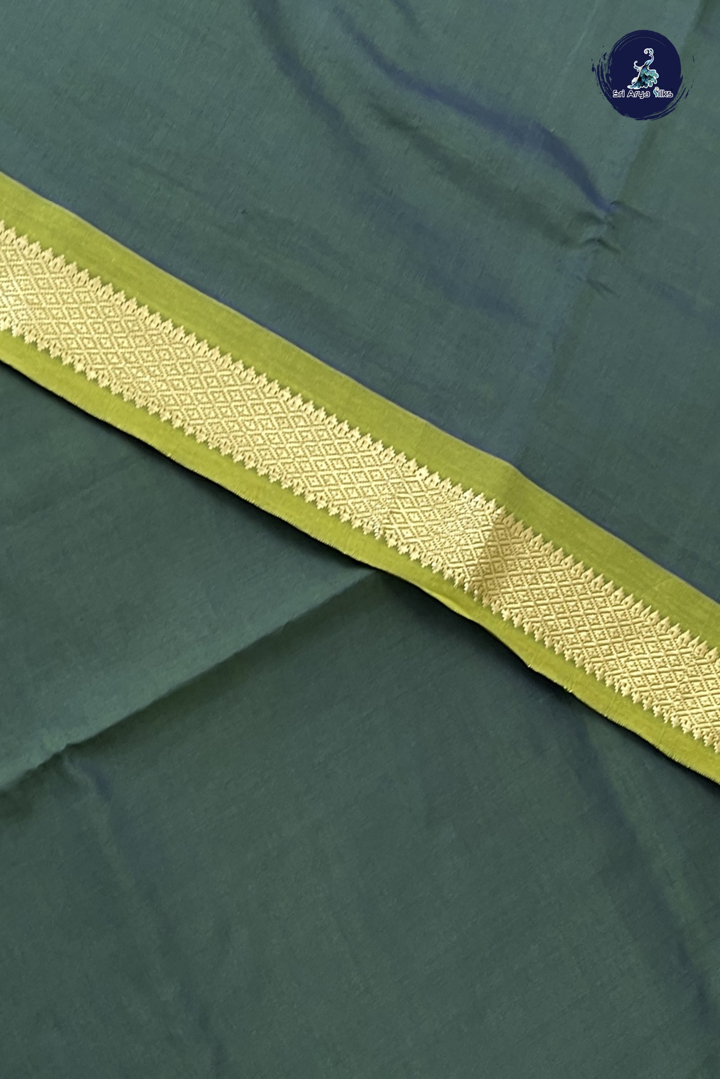 Dark Green Kanchi Semi Silk Cotton Saree With Plain Pattern