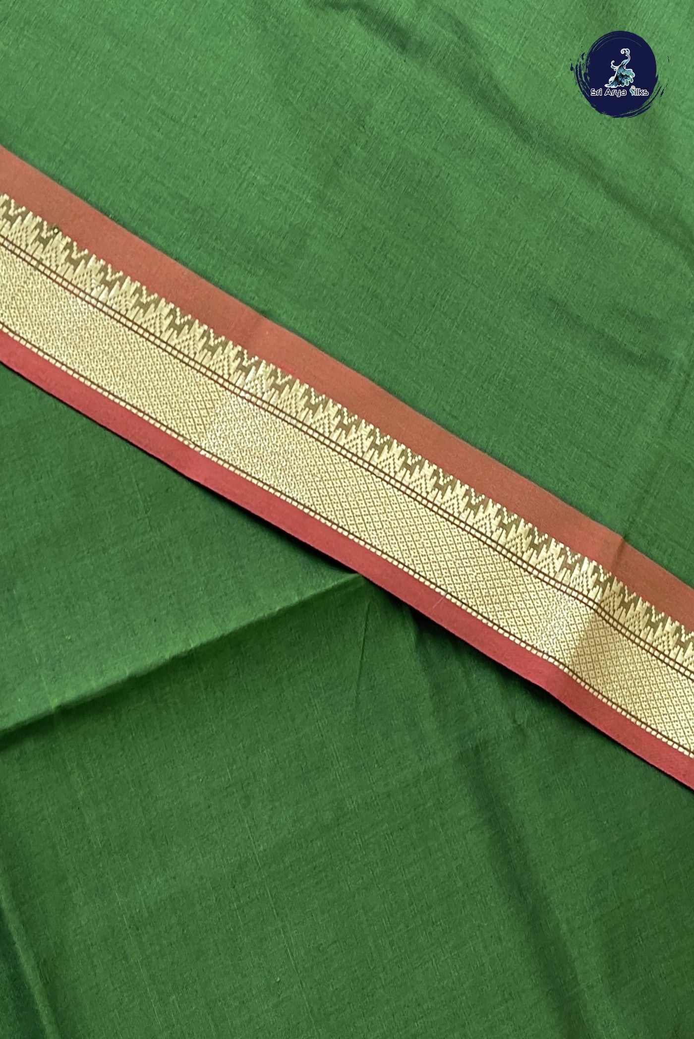 Green Kanchi Semi Silk Cotton Saree With Plain Pattern