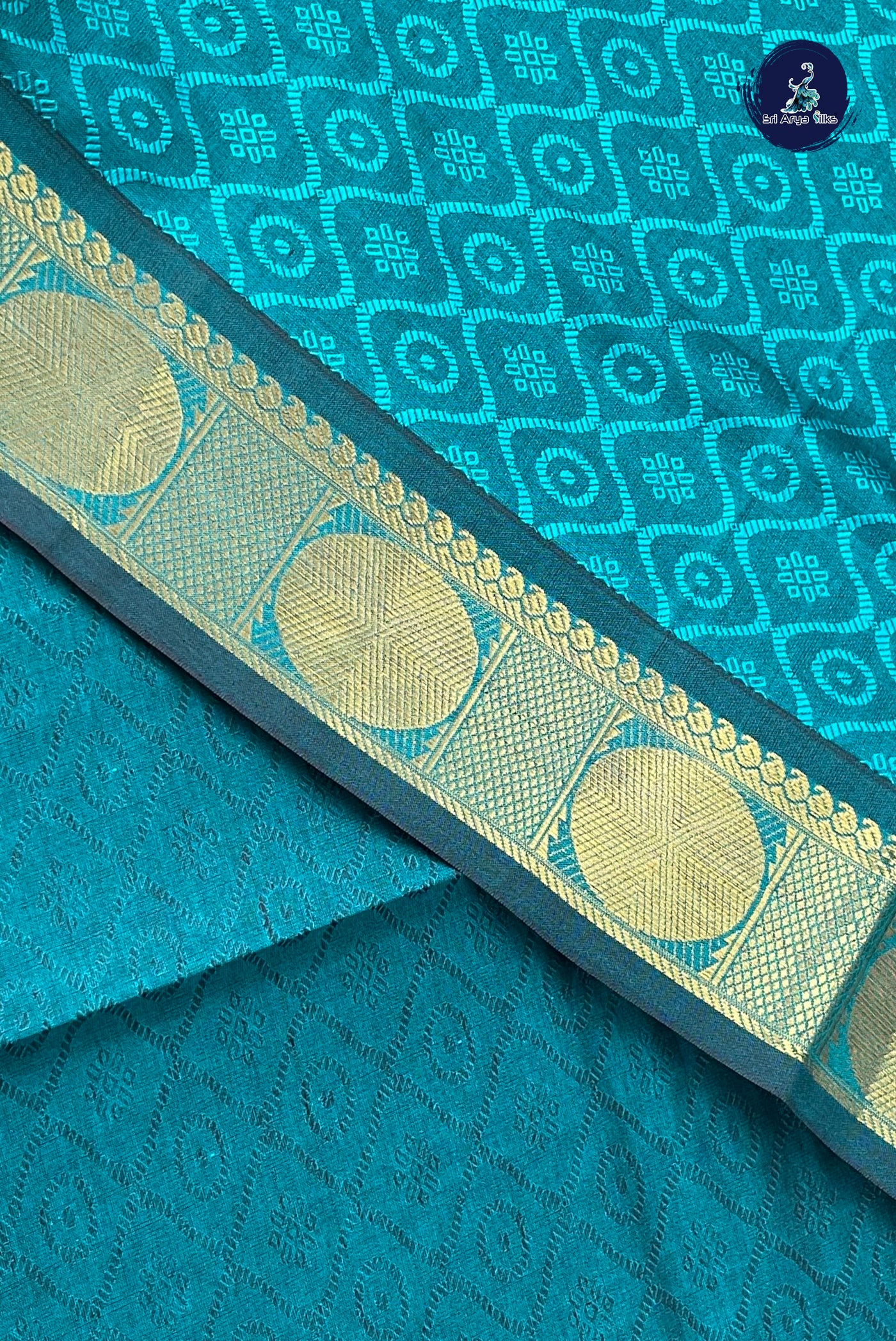 Teal Blue Half Pure Silk Cotton Saree With Embossed Pattern
