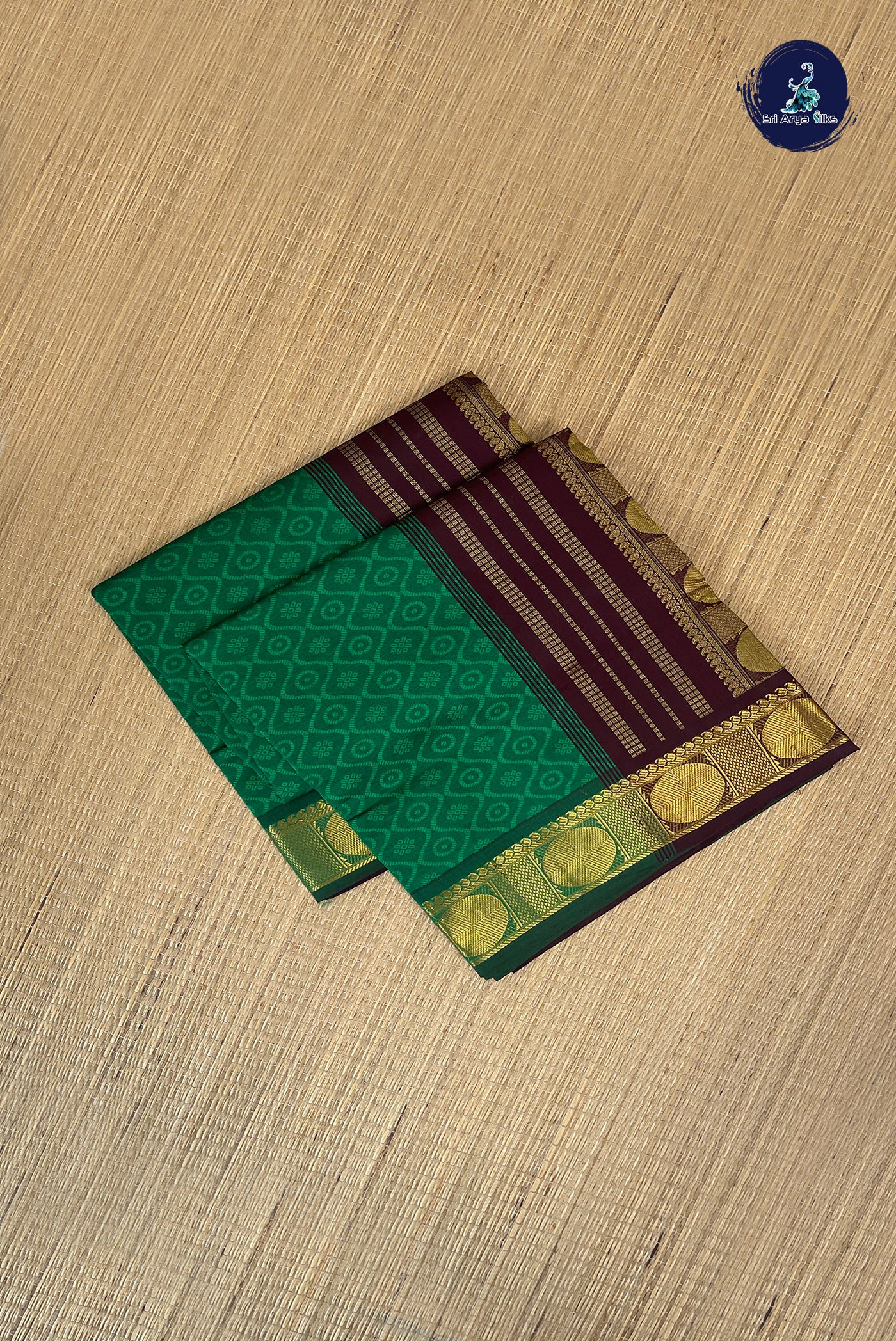 Dark Green Half Pure Silk Cotton Saree With Embossed Pattern