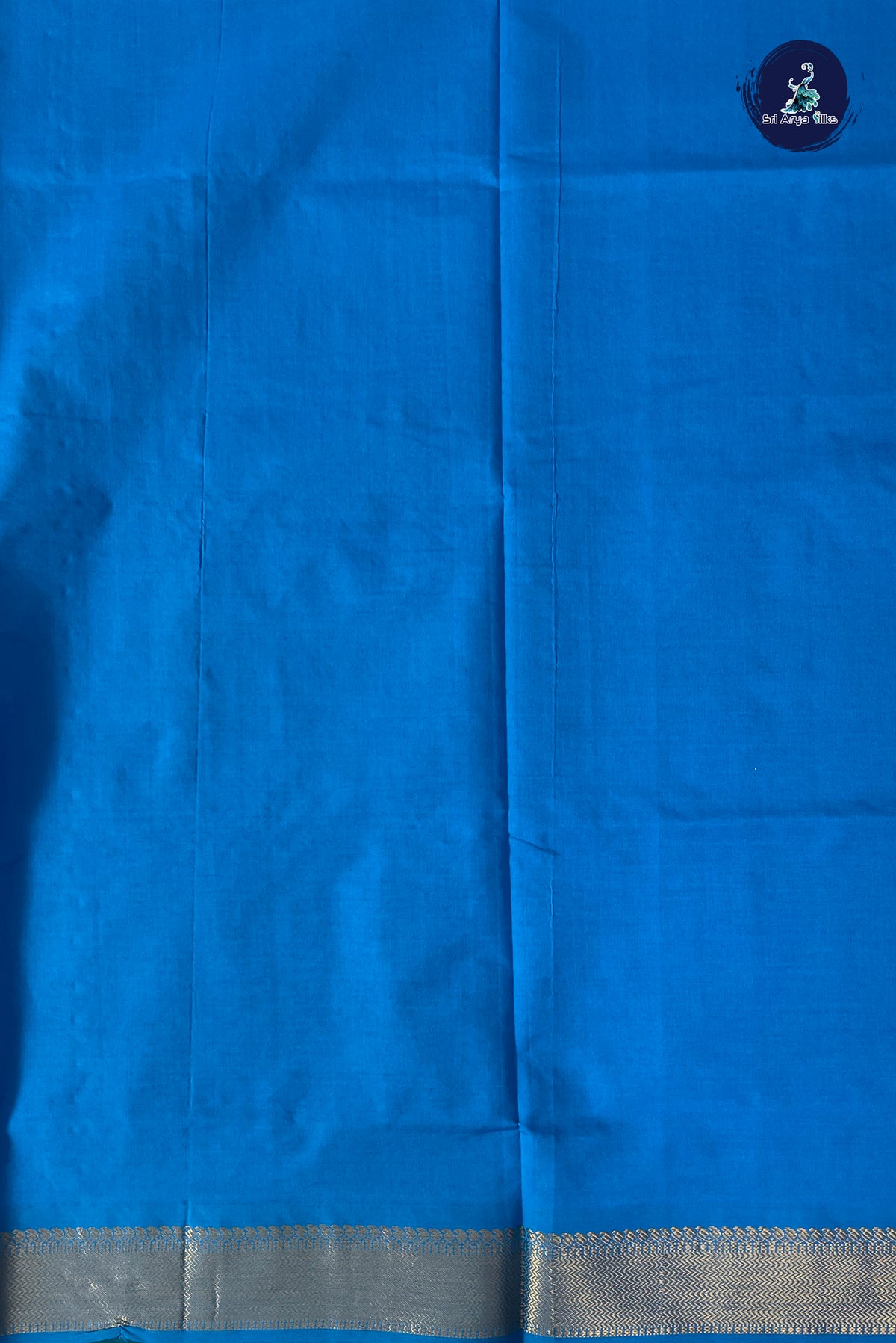 Dark Green Half Pure Silk Cotton Saree With Embossed Pattern